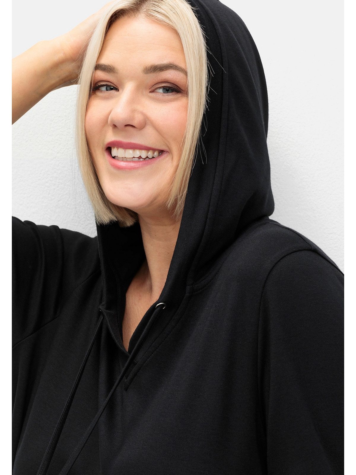 Sheego Sweatkleid Große Größen mit Vokuhila-Saum, aus Interlock