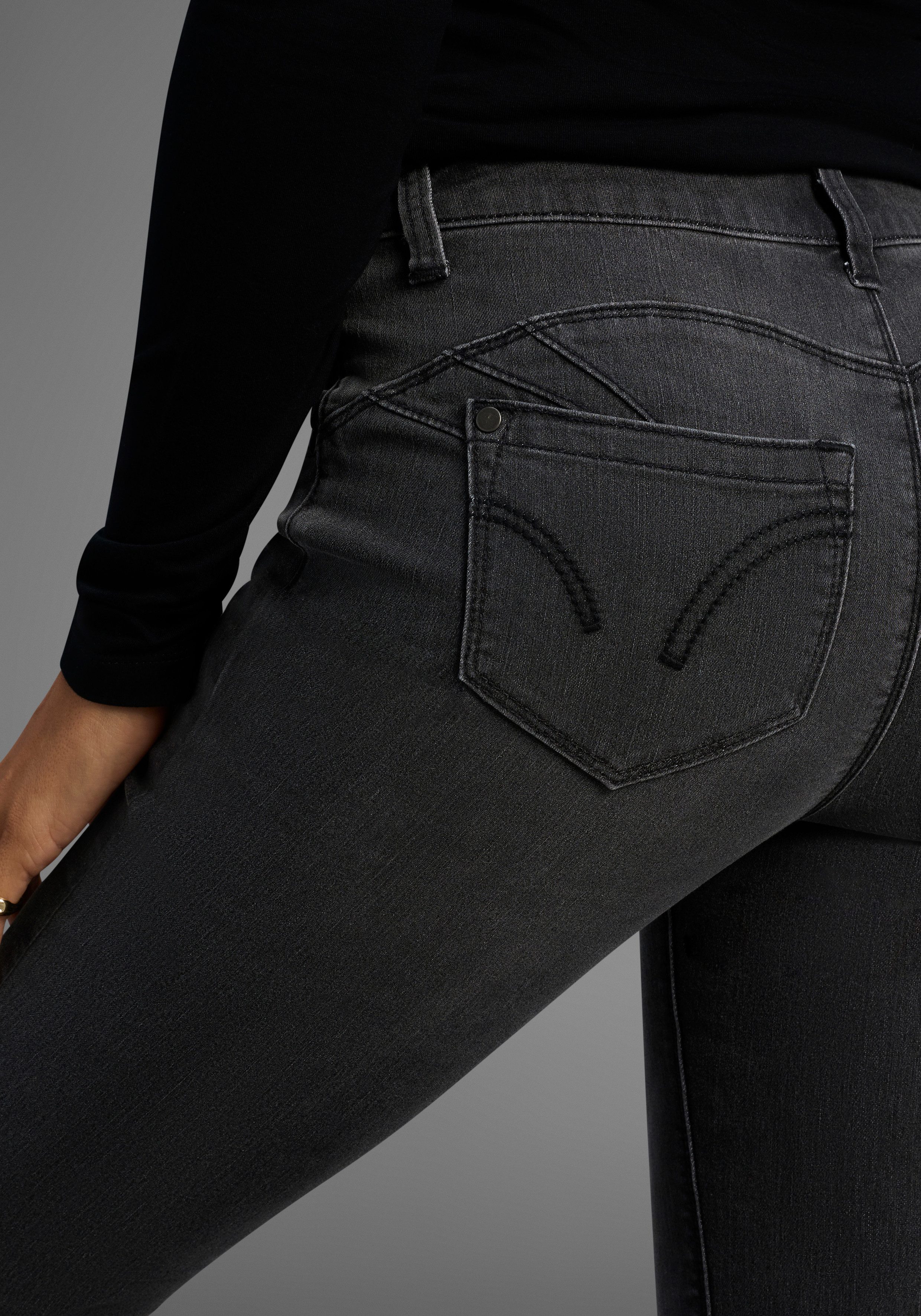 Arizona Bootcut-Jeans Shaping bootcut, Kontrastnähte, Used-Look-Waschung, niedrige Leibhöhe