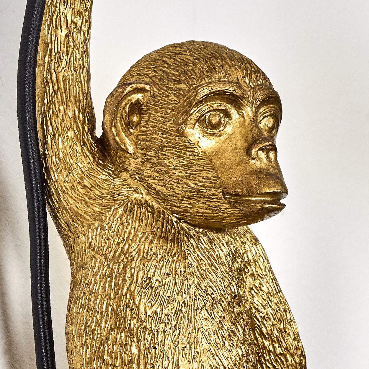 hofstein Wandleuchte »Villafranca« Wandlampe aus Metall/Kunststoff in Schwarz/Goldfarben, ohne Leuchtmittel, 1xE27, Wandspot im Retro/Vintage Design mit Figur eines Affen