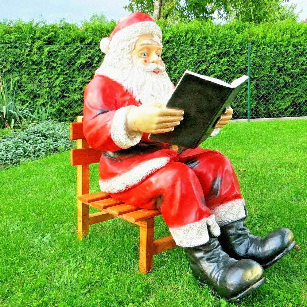 Weihnachtsfigur XXL Weihnachtsmann mit Buch auf Holzstuhl Deko