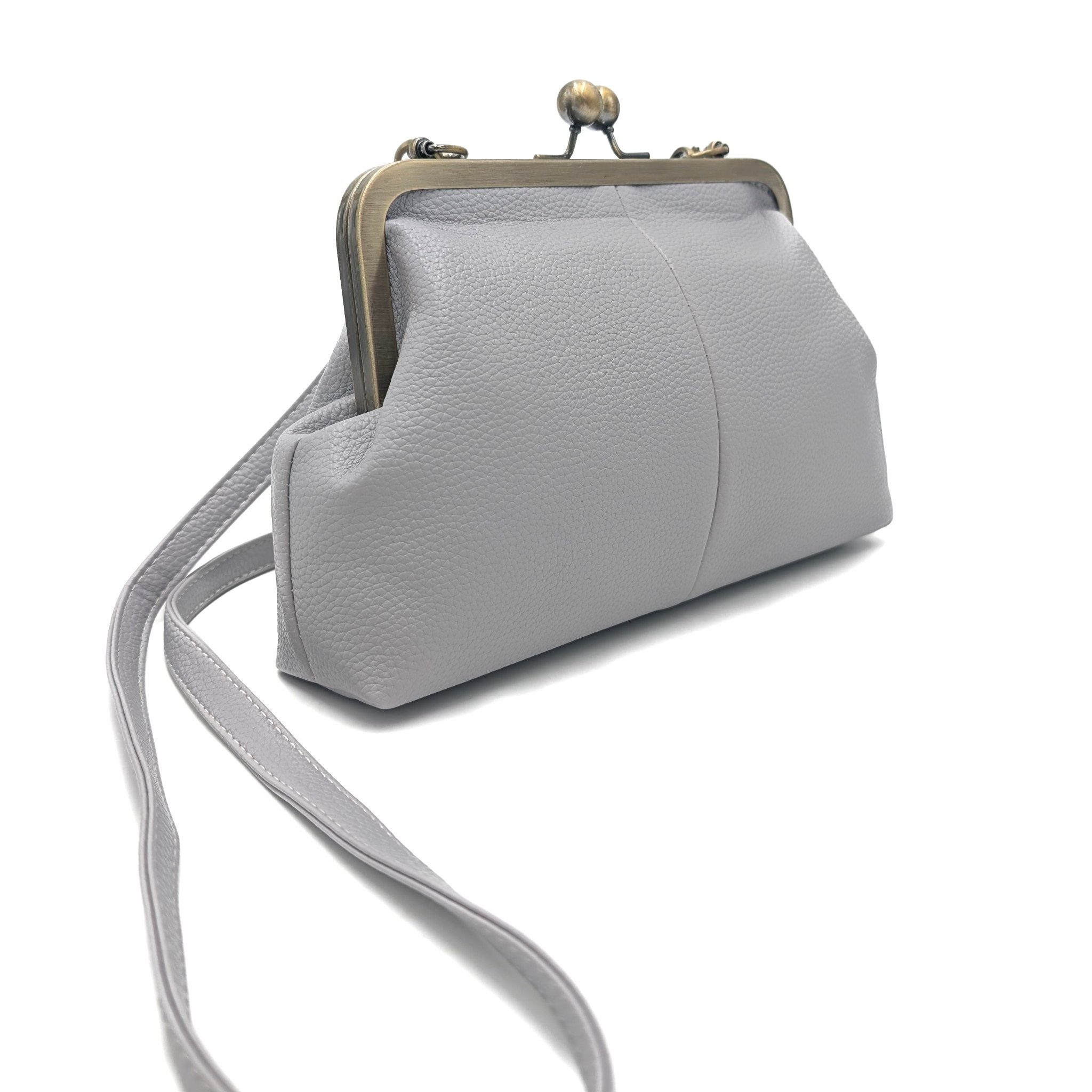 Mera Vellon Umhängetasche Damen Handtasche Novela, Umhängetasche aus veganem Leder und mit Clipverschluss