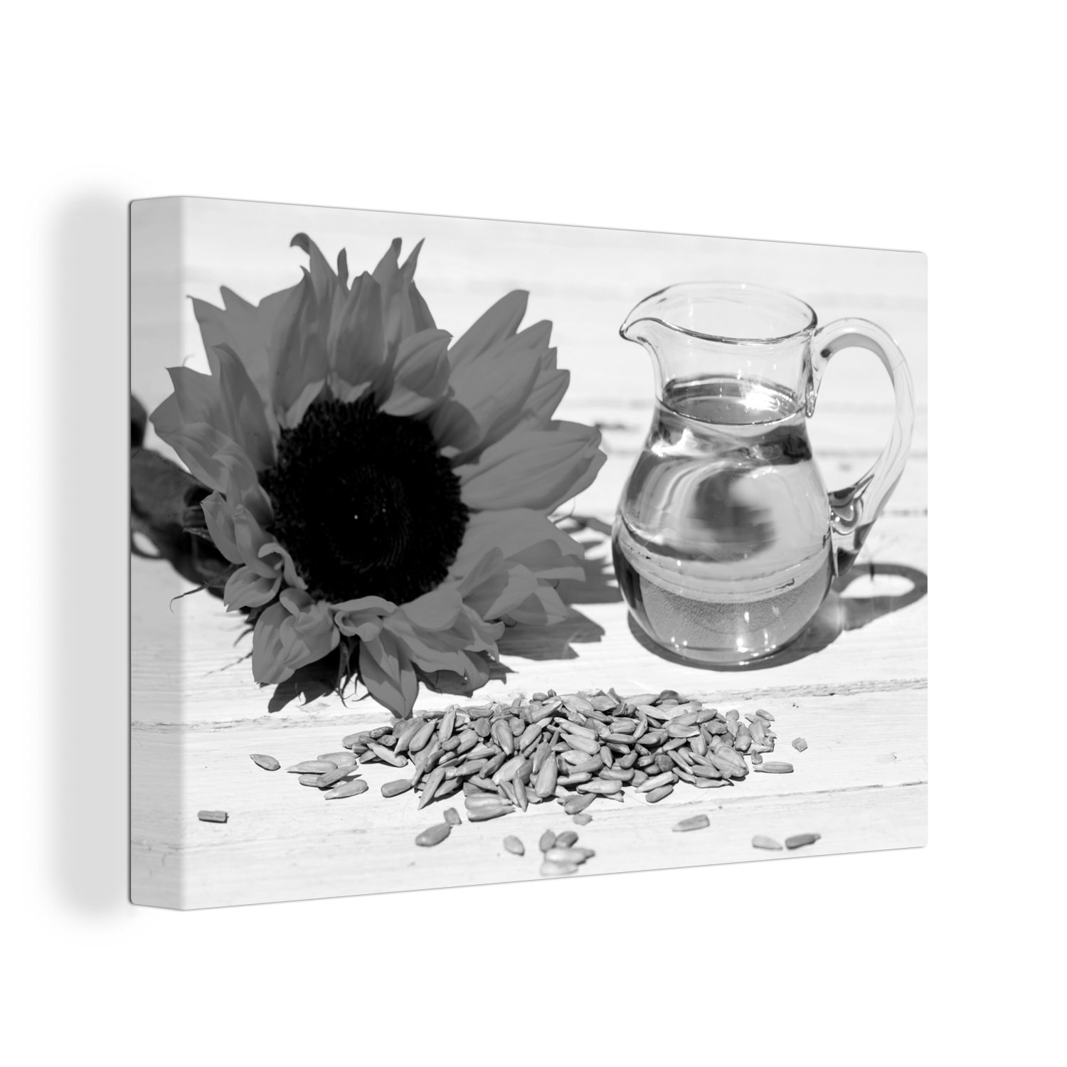 OneMillionCanvasses® Leinwandbild Sonnenblumenkerne mit Sonnenblumenöl in einem kleinen Glas und, (1 St), Wandbild Leinwandbilder, Aufhängefertig, Wanddeko, 30x20 cm