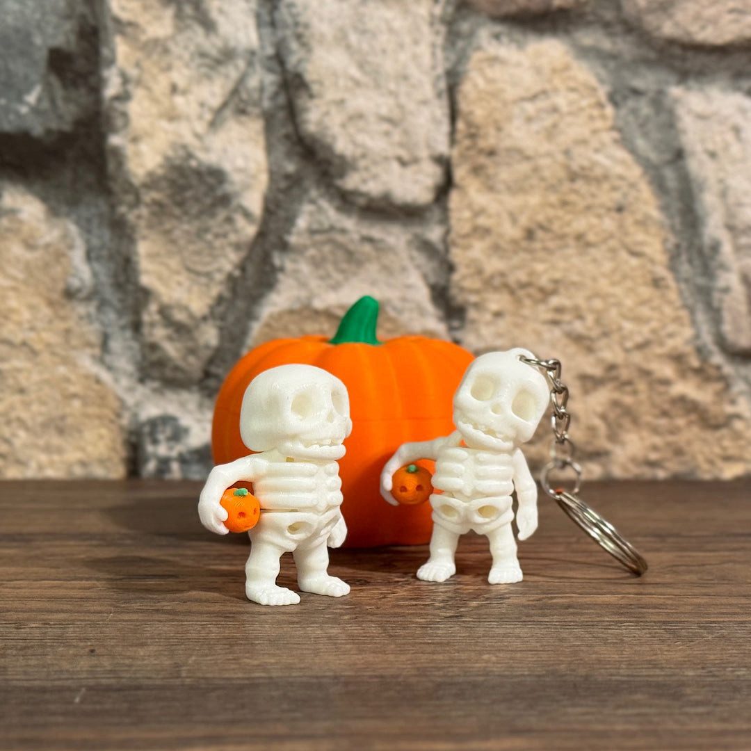 UDINGO Schlüsselanhänger Mini-Skelett mit Kürbis