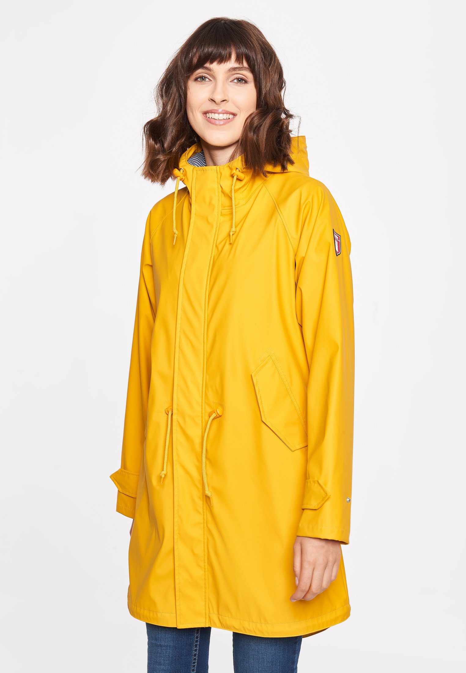 Derbe Regen- und Matschjacke Traveby Friese PVC und PFC frei, wasserabweisend, winddicht, Kapuze