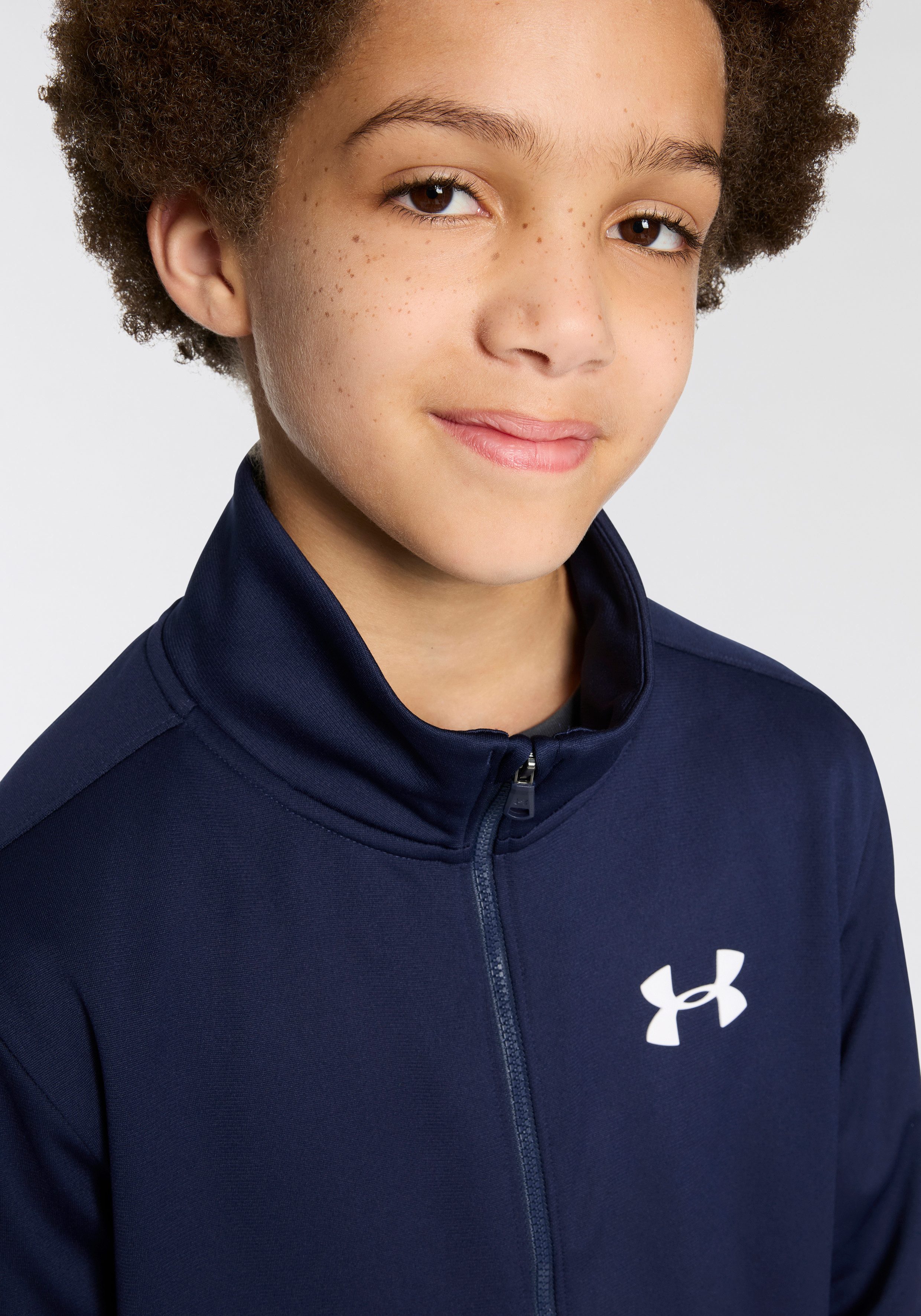 Under Armour® Trainingsanzug UA Rival Knit Track Suit, weiches, innen angerautes Material, schnell trocknendes Polyester
