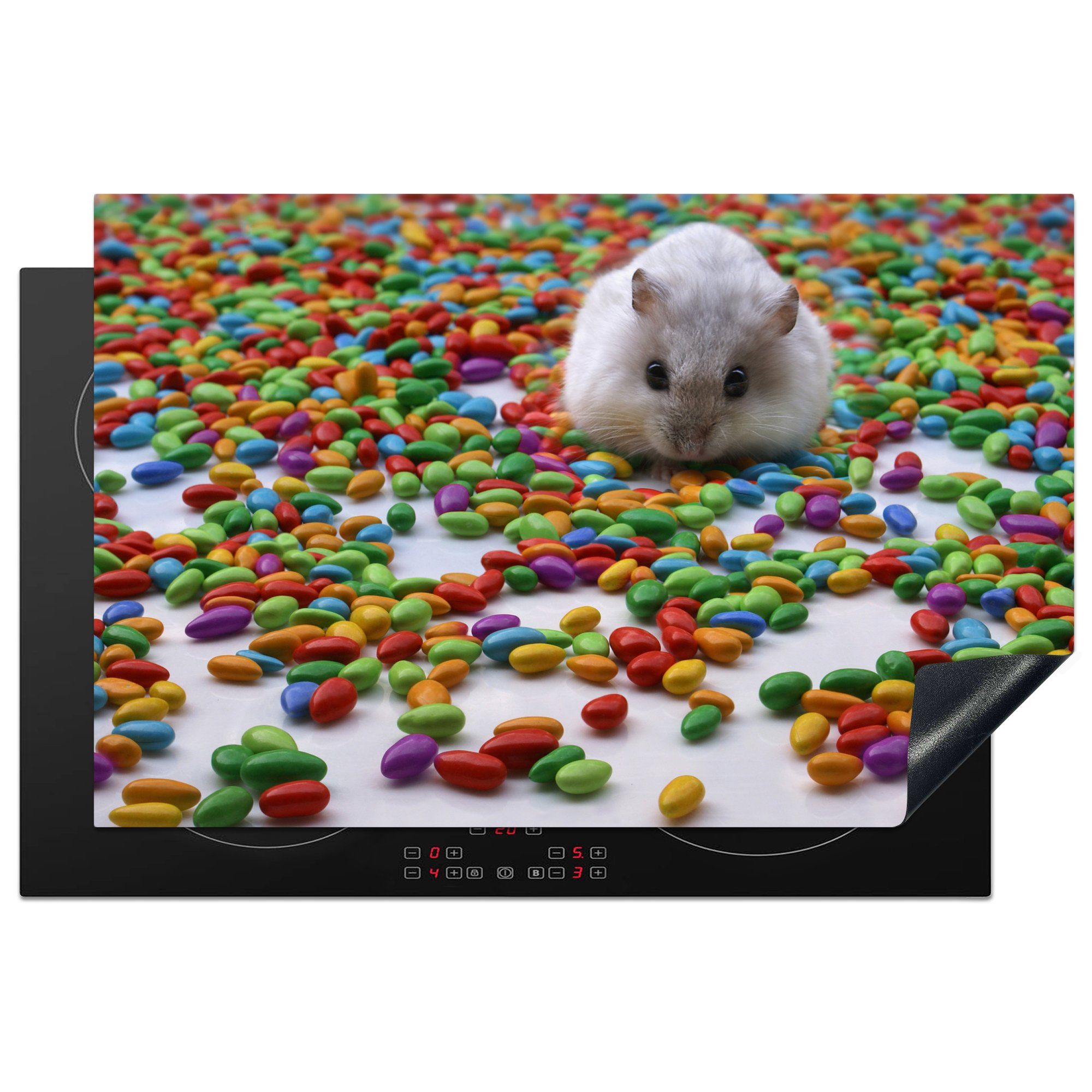 MuchoWow Herdblende-/Abdeckplatte Hamster zwischen den bunten 81x52 die für Schutz küche, cm, Ceranfeldabdeckung (1 Induktionskochfeld tlg), Vinyl, Bonbons