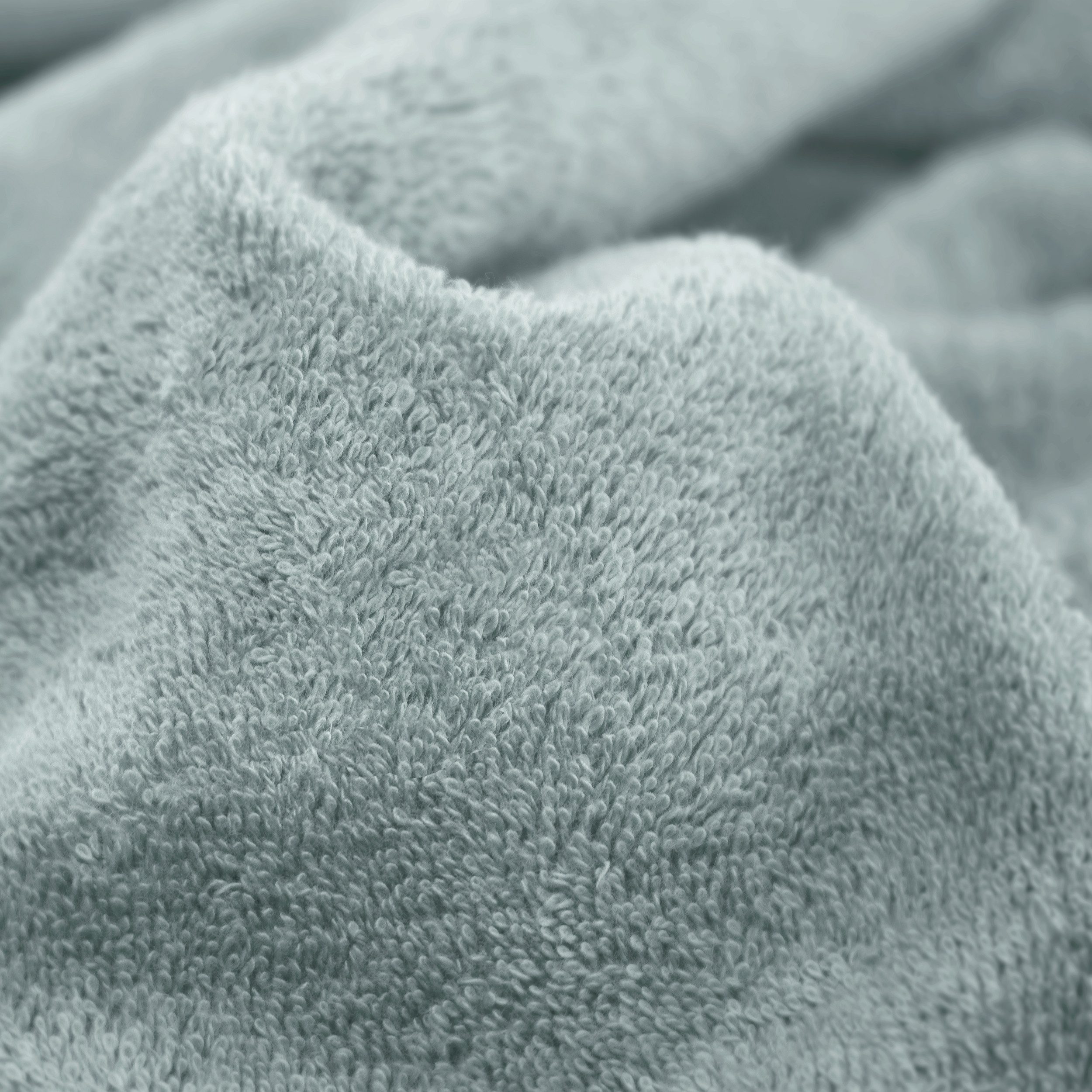Möve Waschhandschuh Superwuschel 100% Premium Cotton Baumwolle, Walkfrottier (1-St), mit Biesenbordüre und praktischem Kordelaufhänger, einfarbig, weich
