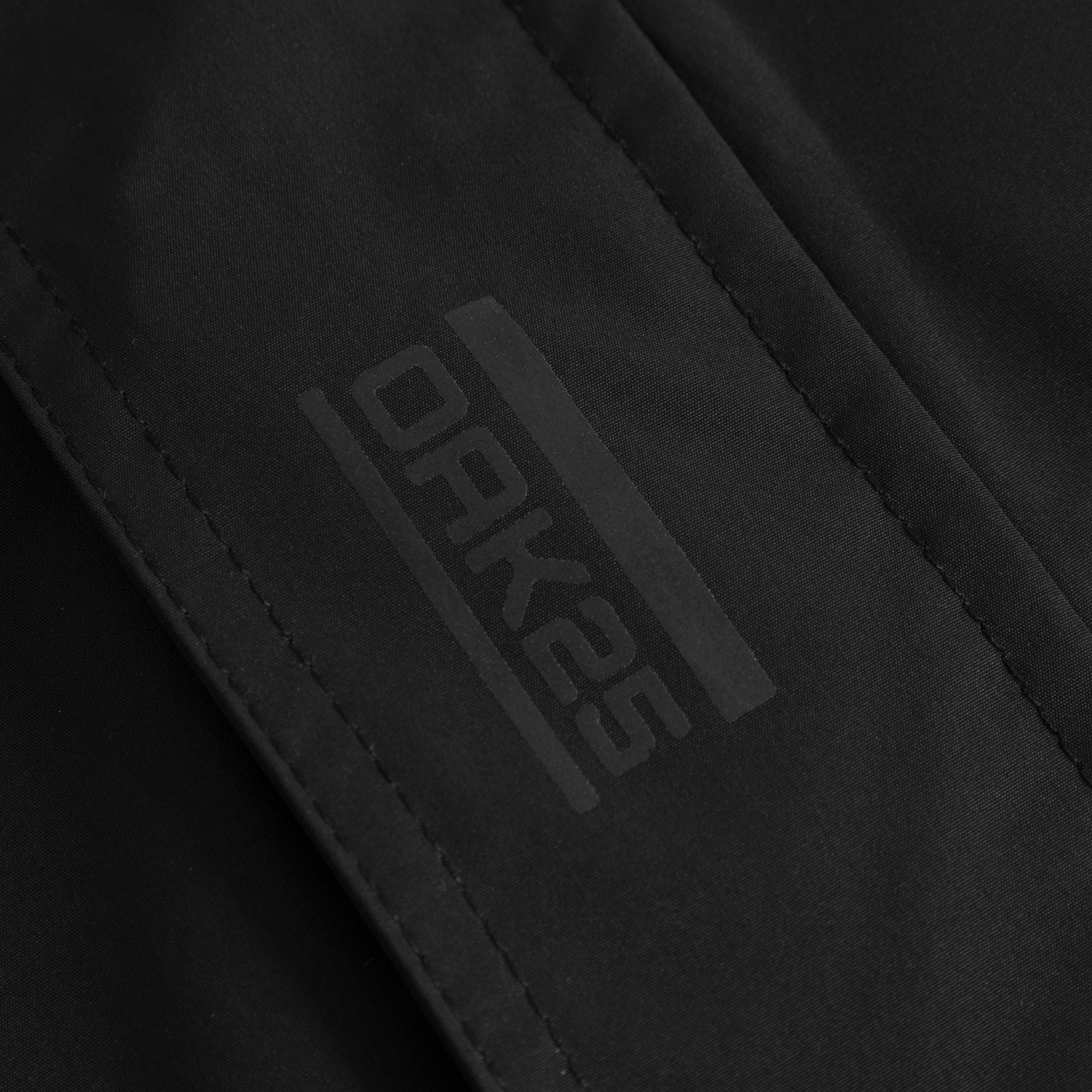 OAK25 Regenjacke Commute Rainbreaker Windbreaker Regenjacke (1-St) Verstaubare Übergangsjacke, 10.000mm Wassersäule