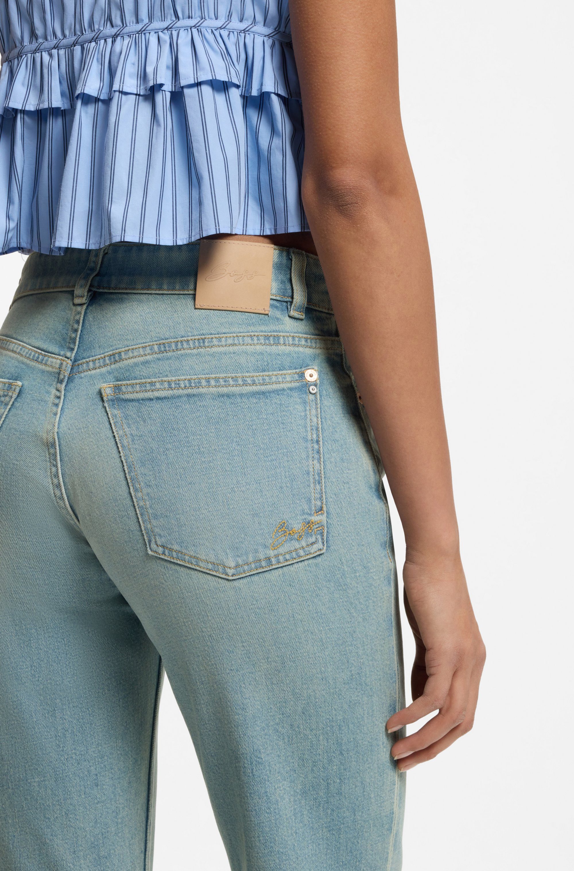 BOSS ORANGE Weite Jeans SOFT BOOTCUT 2.0 Premium Damenmode Flare-Fit, Low Waist