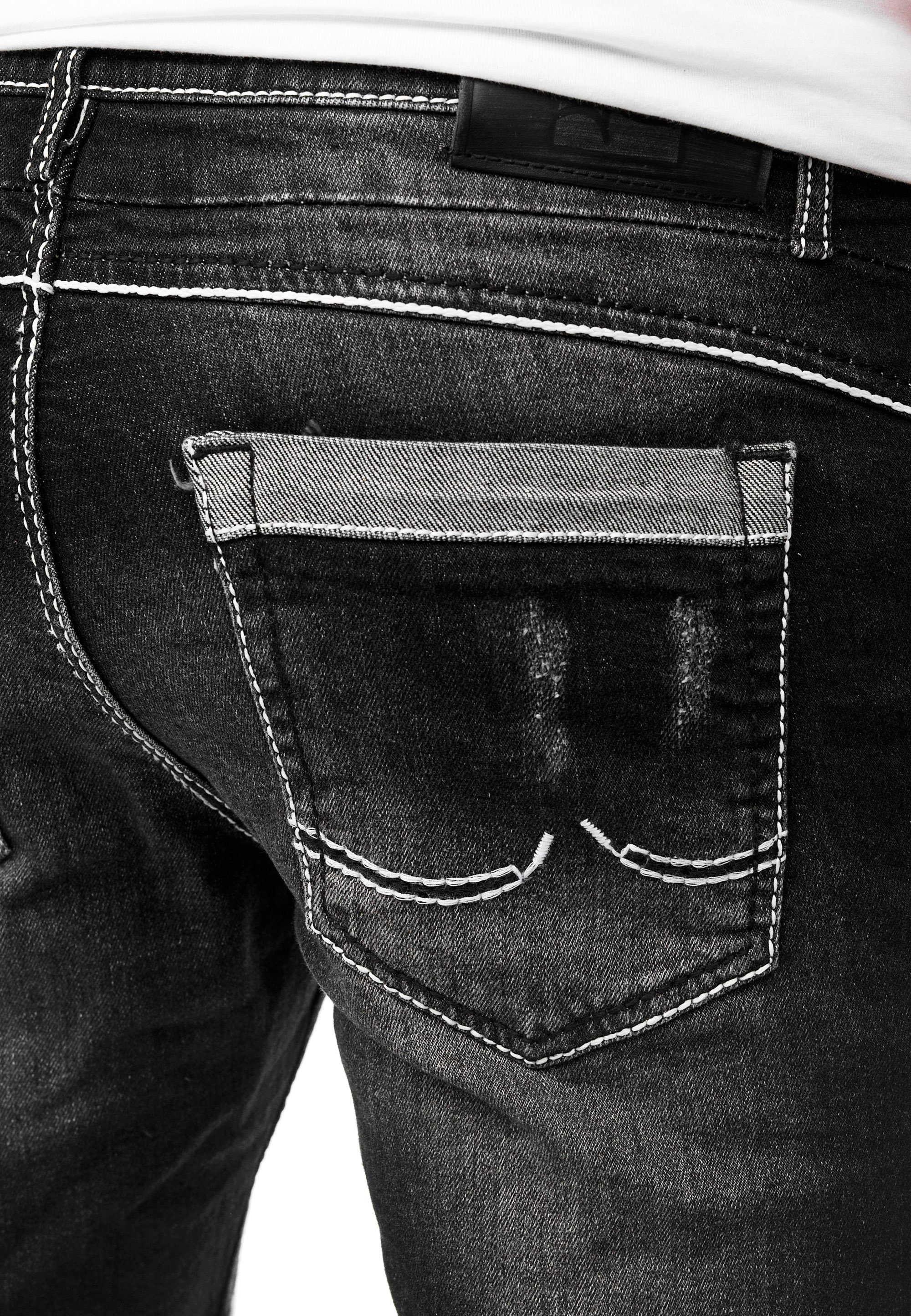 Rusty Neal Straight-Jeans URUMA mit Zierelementen trendigen schwarz