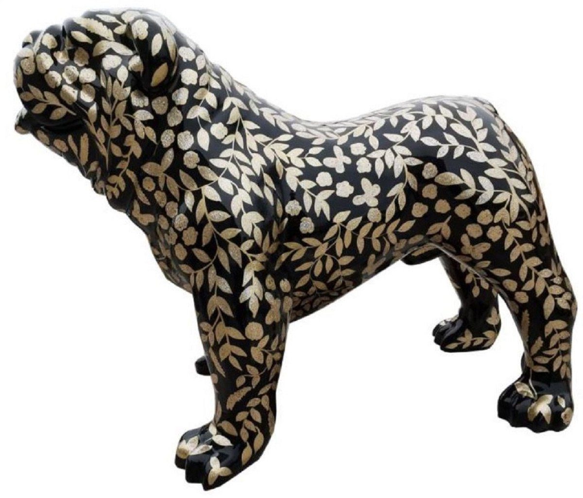 Casa Padrino Skulptur Designer Dekofigur Hund Bulldogge mit Glitzer Look Schwarz / Gold 90 x H. 74 cm - Wetterbeständige Deko Skulptur - Wohnzimmer Deko - Garten Deko - Designer Deko Tierfigur
