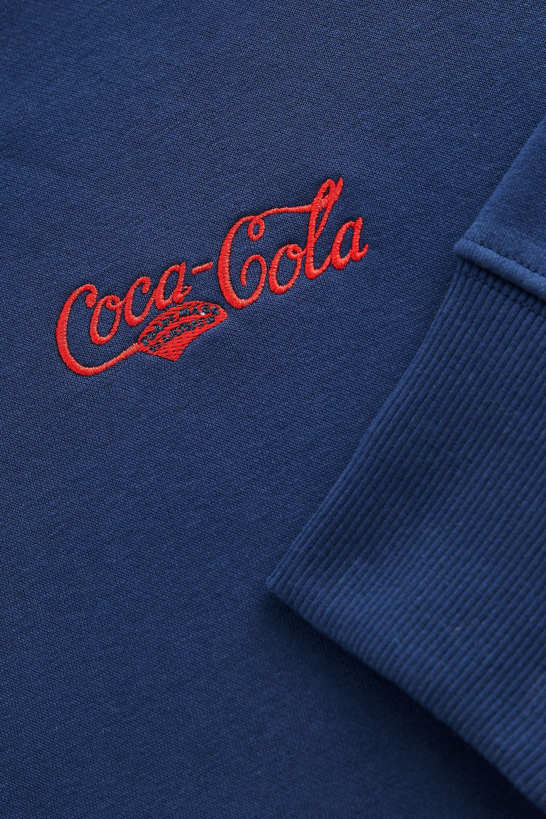 Next Kapuzensweatshirt Lizenziertes Sweatshirt, Coca Cola, Kurzgröße (1-tlg)