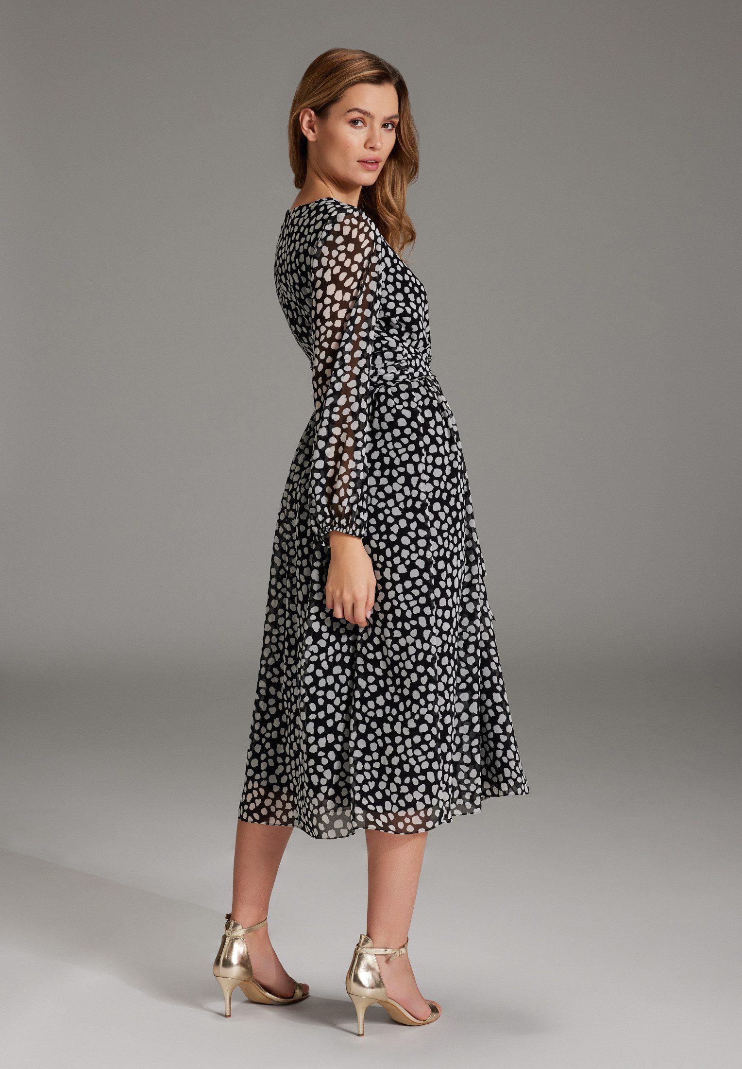 SWING Cocktailkleid Taillierter Schnitt mit fließendem günstig online kaufen