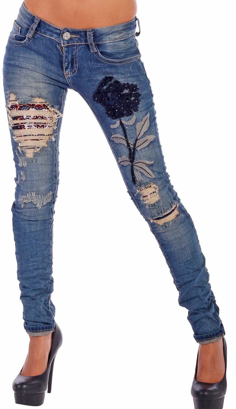 Charis Moda mit Röhrenjeans vielen Applikationen destroyed Jeans Skinny