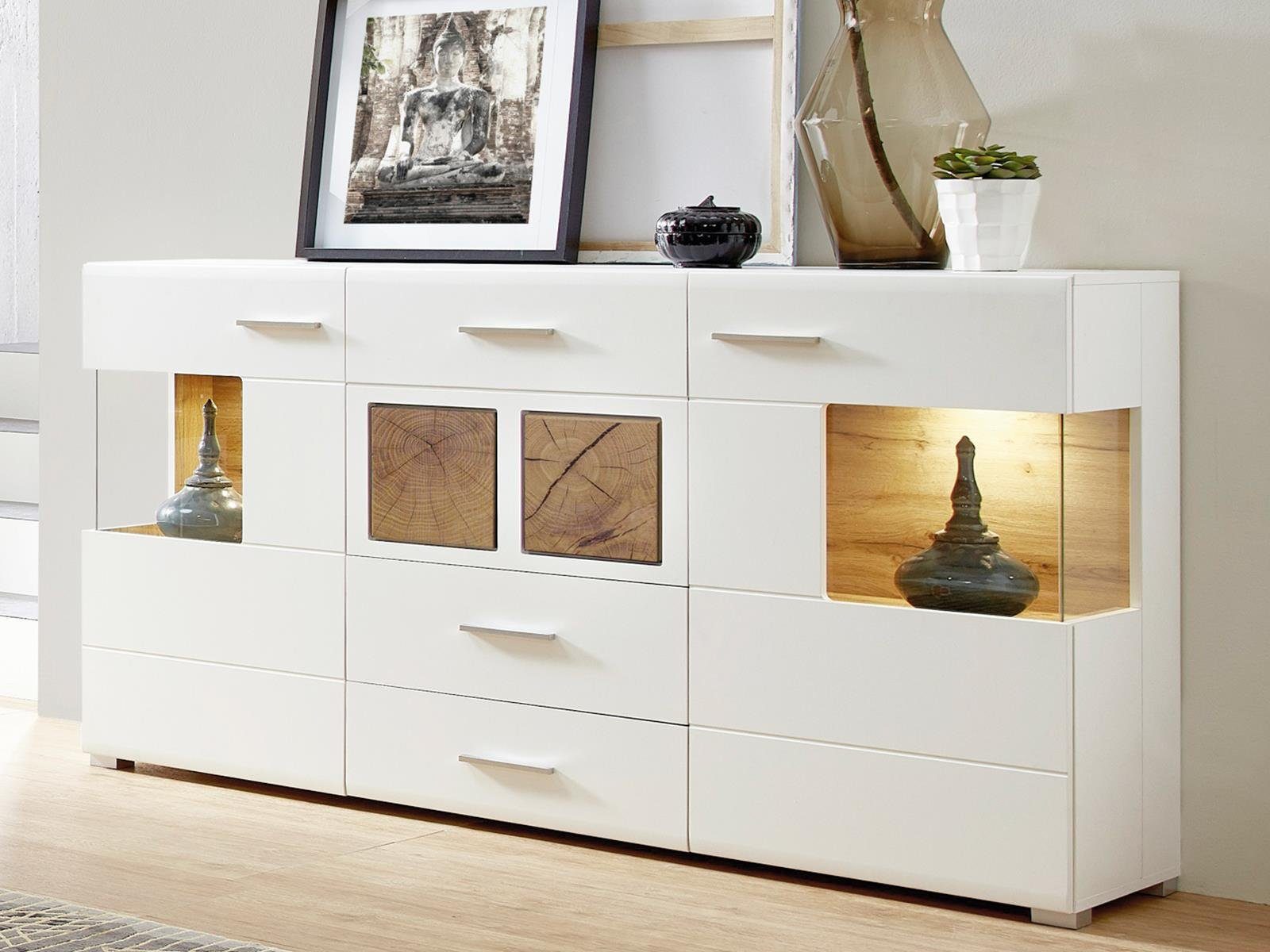 möbelando Sideboard Kathlin, Modernes Sideboard in Weiß-Matt, Korpus aus Spanpatte, Front aus MDF mit Absetzungen aus Spanplatte in Hirnholz Nachbildung mit 2 Glas-/Holztüren, 3 Schubkästen, 4 Konstruktionsböden und 1 Einlegeboden, inkl. LED-Beleuchtung. Breite 170 cm, Höhe 94 cm, Tiefe 42 cm