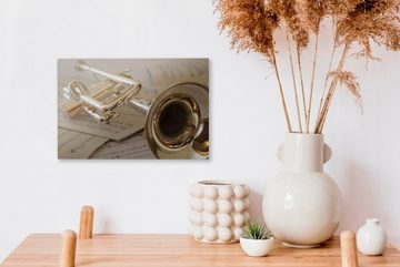 OneMillionCanvasses® Leinwandbild Trompete auf Notenpapier, (1 St), Wandbild Leinwandbilder, Aufhängefertig, Wanddeko, 30x20 cm