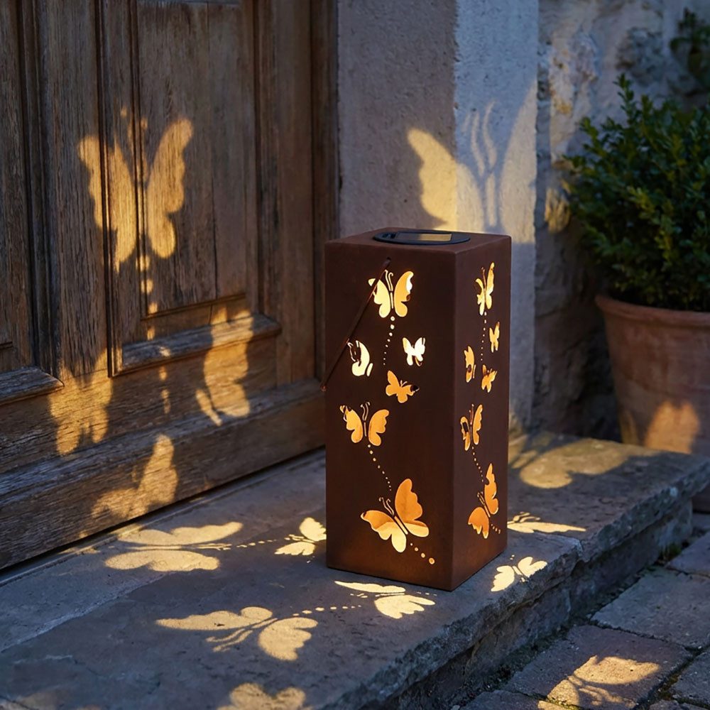 Harms Import LED Solarleuchte, LED-Leuchtmittel fest verbaut, Solarlampe Dekosäule Außen Hängelampe Schmetterling rost LED H 45 cm