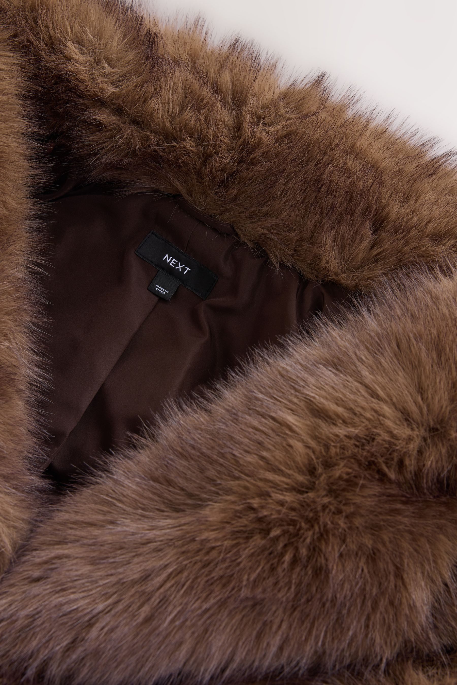 Next Fellimitatmantel Langer Mantel aus Kunstfell (1-tlg)