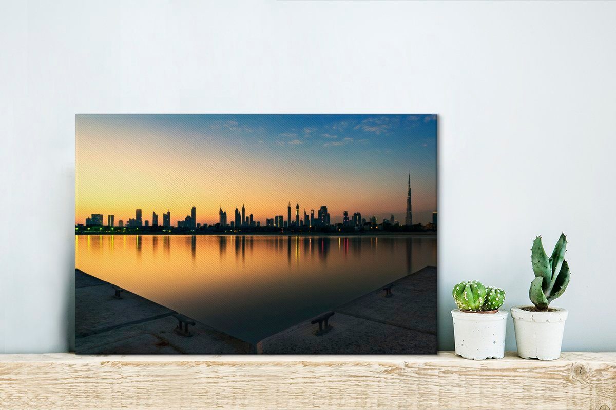 St), Leinwandbilder, Wandbild Leinwandbild 30x20 (1 Wanddeko, Die Dubais OneMillionCanvasses® cm Silhouette bei, von Wolkenkratzern Aufhängefertig, beeindruckende