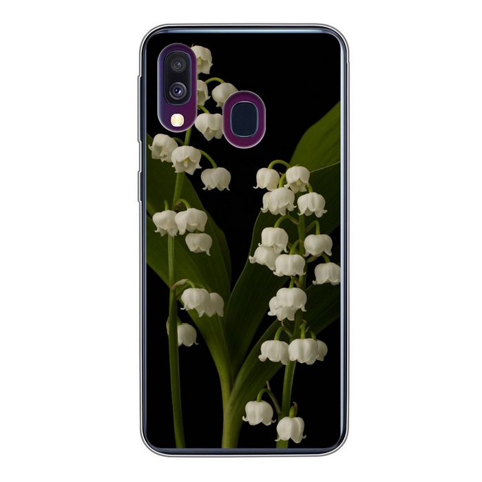 MuchoWow Handyhülle Zwei Maiglöckchenblüten im Dunkeln Handyhülle Samsung Galaxy A40 Smartphone-Bumper Print Handy