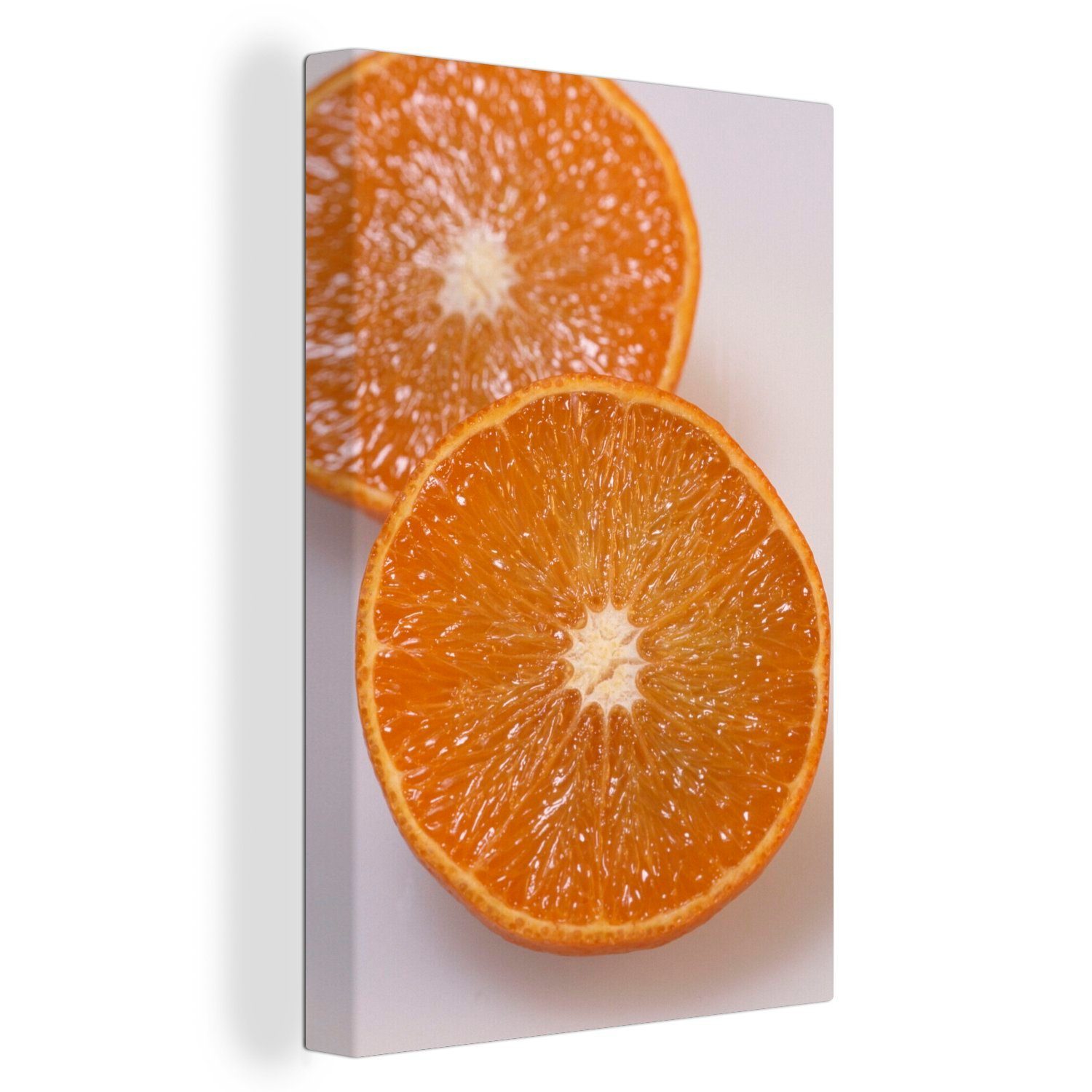 OneMillionCanvasses® Leinwandbild In Scheiben geschnittener Trester und das Fruchtfleisch der Orange, (1 St), Leinwandbild fertig bespannt inkl. Zackenaufhänger, Gemälde, 20x30 cm