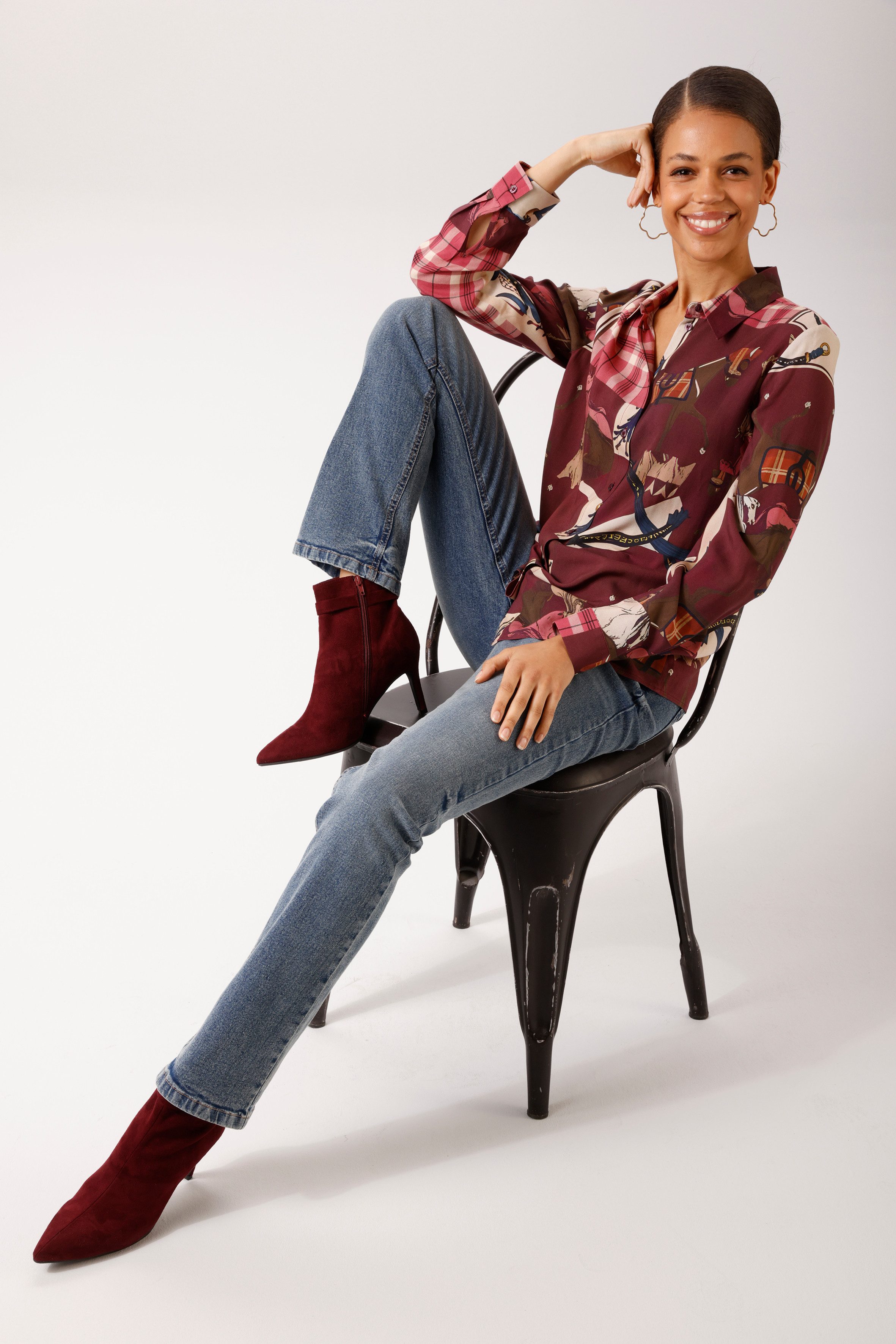 Zum Outfit 7