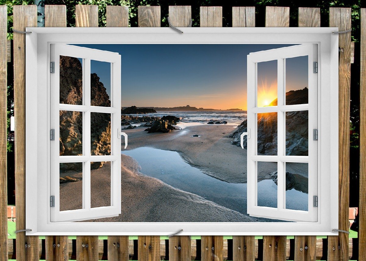 Thumbnail - Wallario Sichtschutzzaunmatten Sonnenuntergang hinter einem Felsen am Strand, mit Fenster-Illusion