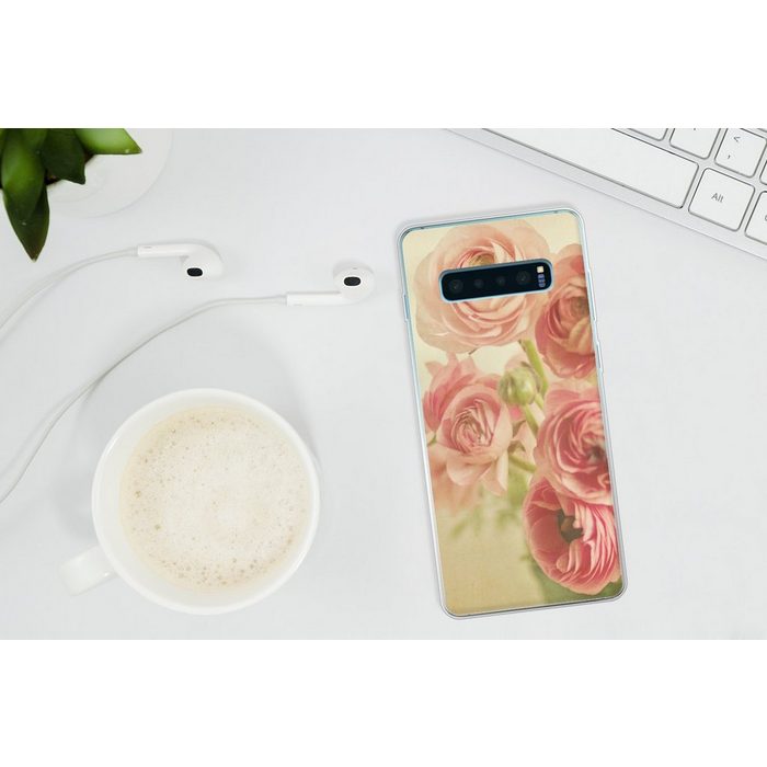 MuchoWow Handyhülle Unscharfes Bild von rosa Butterblumen Phone Case Handyhülle Samsung Galaxy S10+ Silikon Schutzhülle FN11484