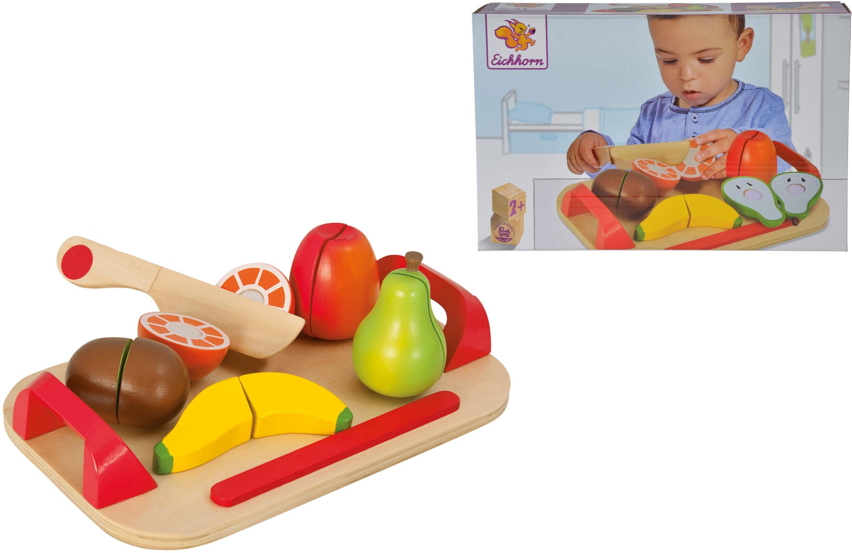 Spiellebensmittel Holzfrüchte auf Brett