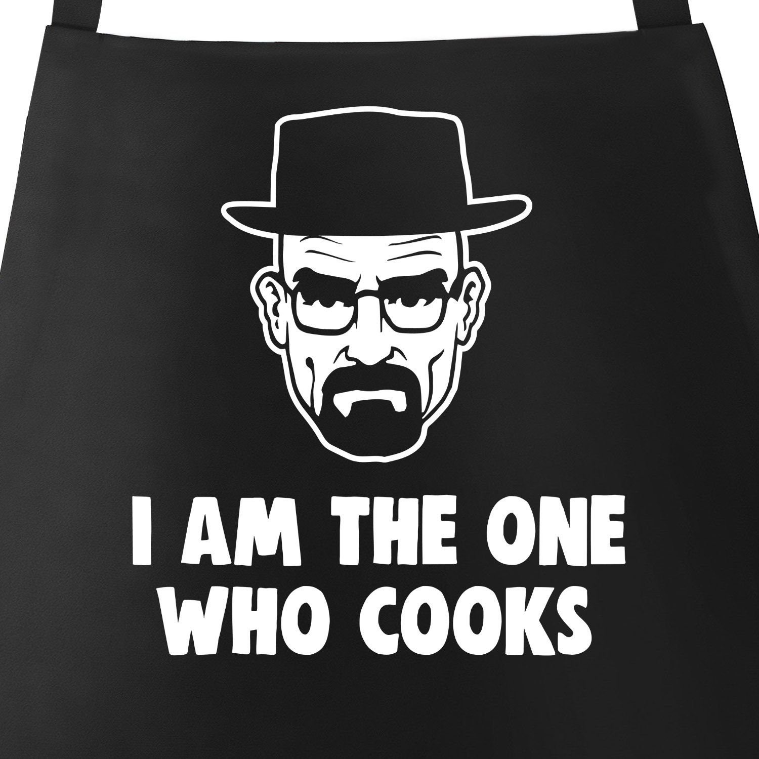 MoonWorks Grillschürze Grill-Schürze für Männer mit Spruch I am the one who cooks Baumwoll-Schürze Küchenschürze Moonworks®, mit kreativem Aufdruck