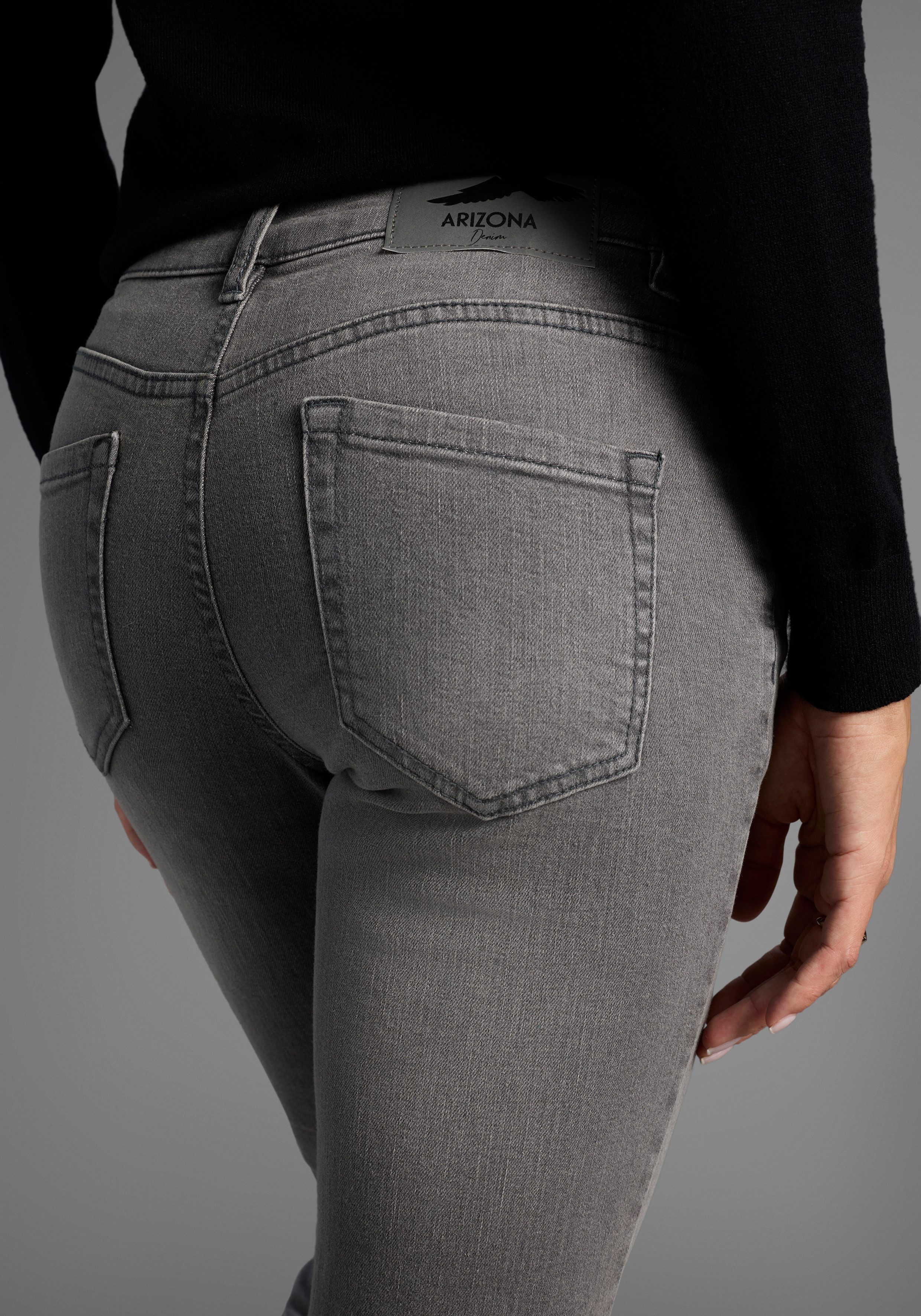 Arizona Slim-fit-Jeans Bund mit seitlichem Gummizugeinsatz schmale Passform, Röhrenjeans, Used-Waschung, hohe Leibhöhe