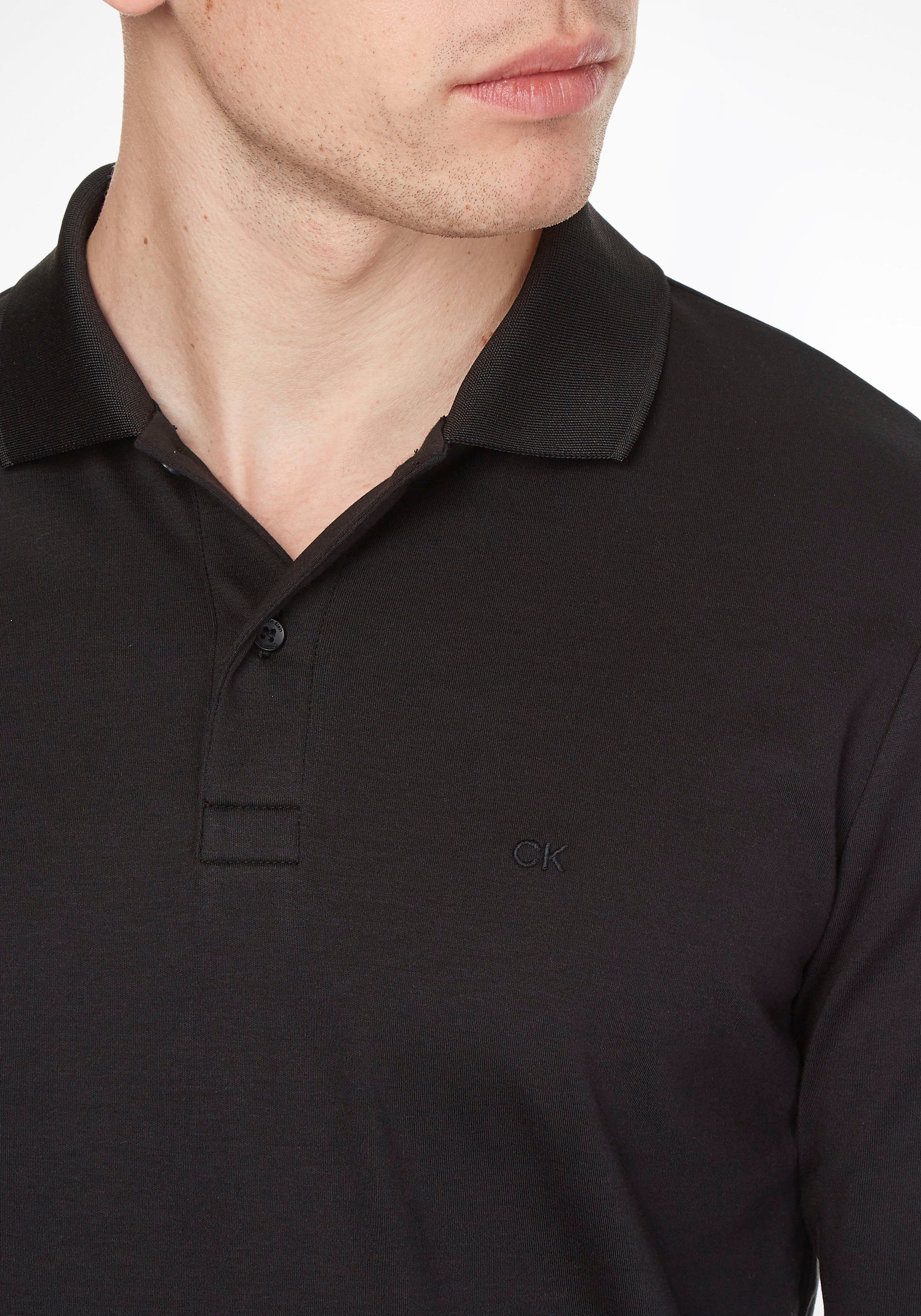 Calvin Klein Ärmelabschluss mit black Poloshirt Bündchen ck am