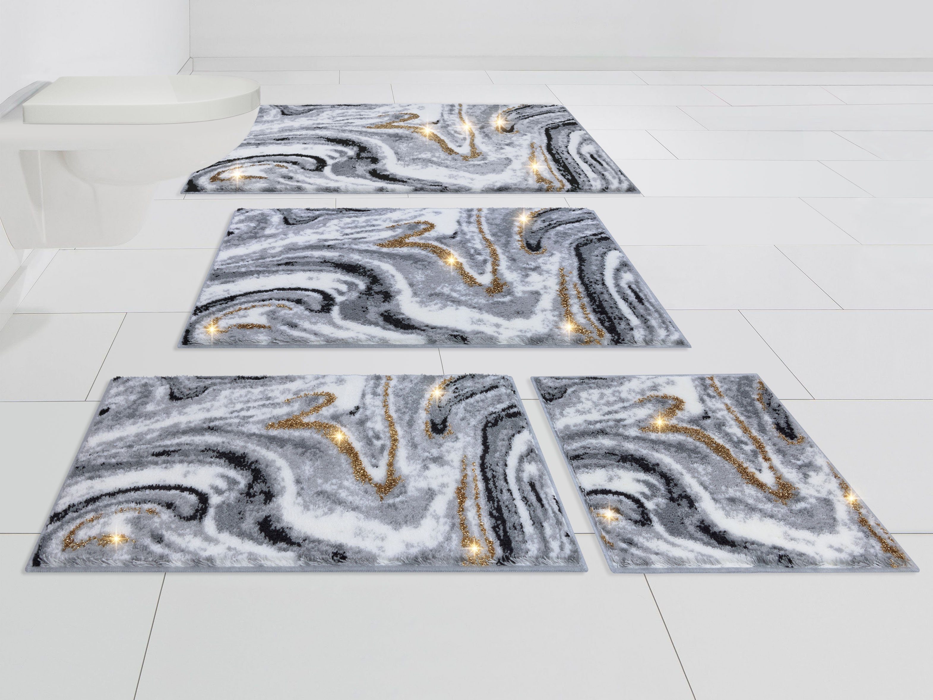 OTTO home Badematte Gloria, Höhe 20 mm, rutschhemmend beschichtet, fußbodenheizungsgeeignet, Polyacryl, rechteckig, goldfarbene Akzente durch Glitzer-Garn, Marmor-Design, Made in Europe