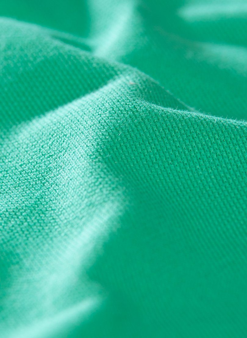 DELUXE green Piqué Poloshirt Trigema Poloshirt TRIGEMA