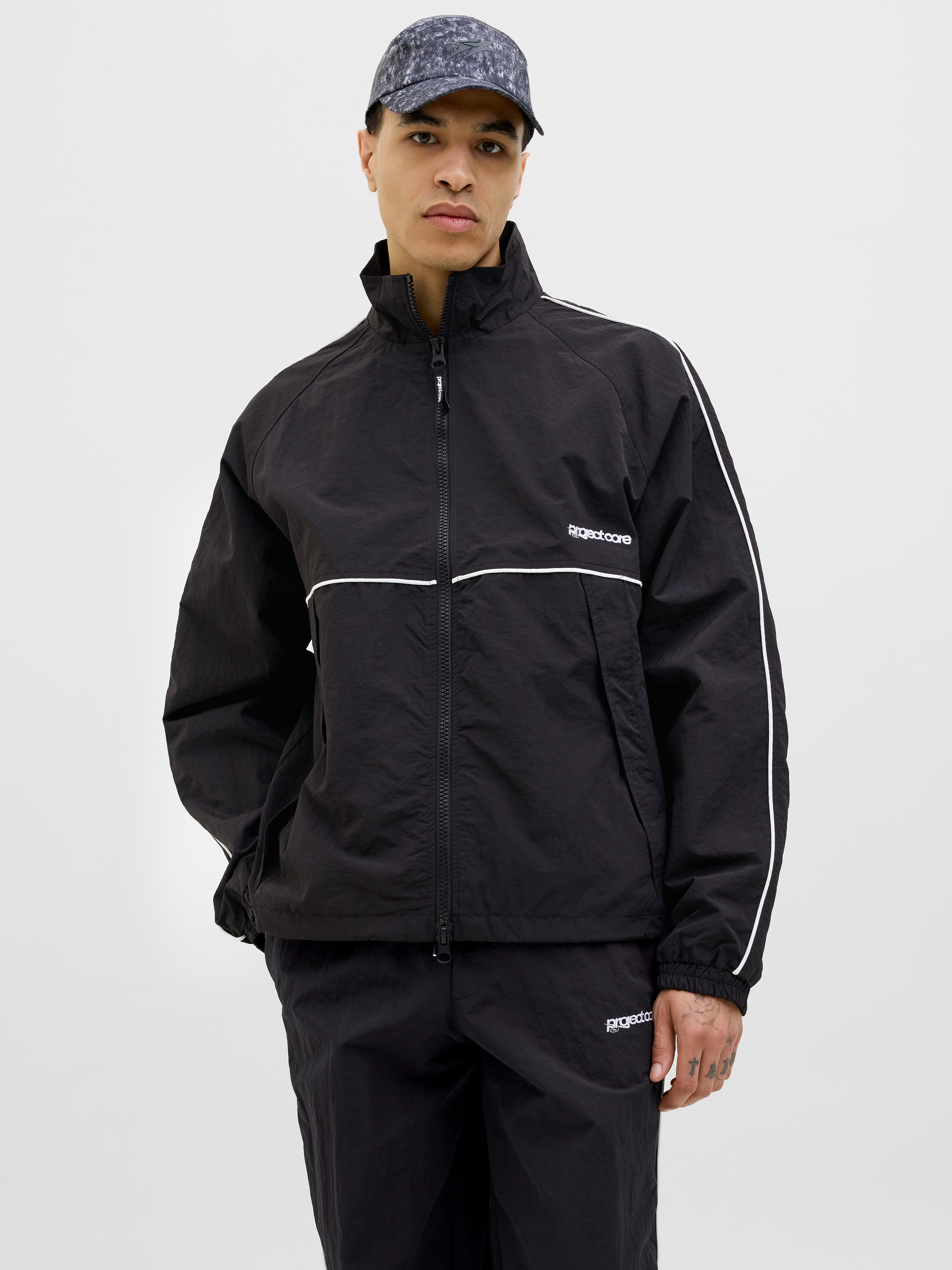 Jack & Jones Outdoorjacke JCOUNION TRACK JACKET SN Mit stylischem Print