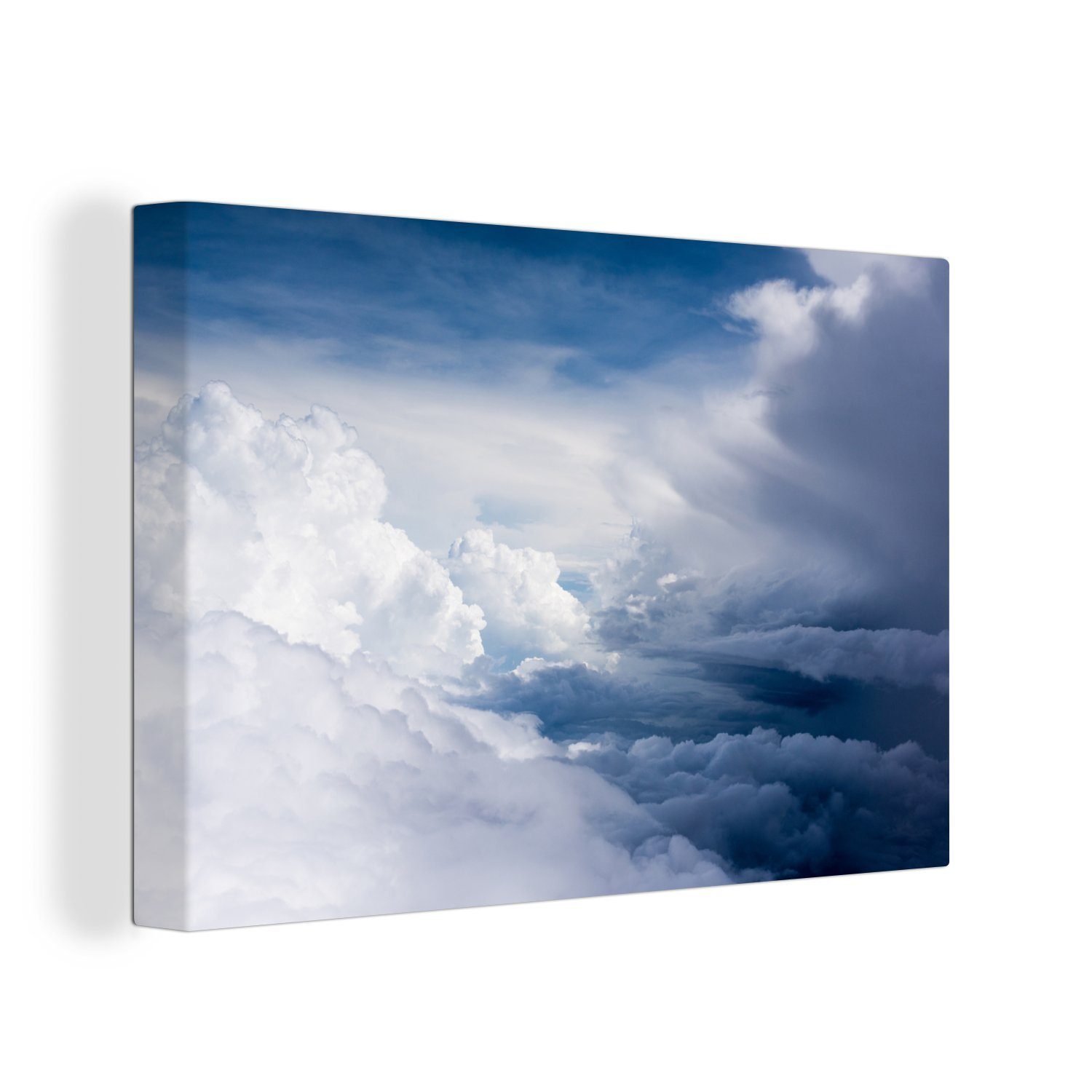 OneMillionCanvasses® Leinwandbild Große weiße Wolken an einem dunkelblauen Himmel, Fotodruck (1 St), Leinwand Изображения Klein, Wand Dekoration Aesthetic 30x20 cm