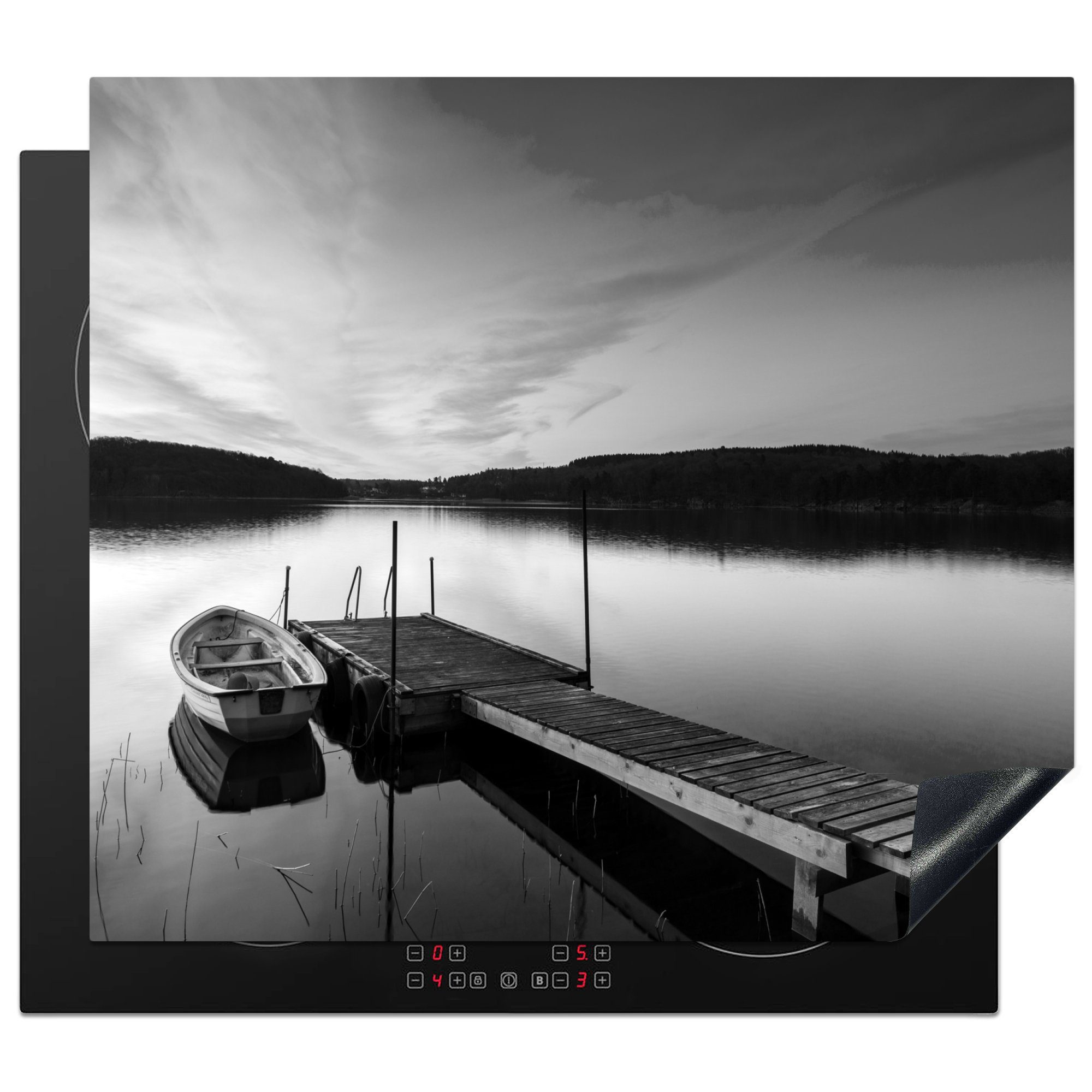 MuchoWow Herdblende-/Abdeckplatte Ruderboot an einem Bootssteg - schwarz und weiß, Vinyl, (1 tlg), 60x52 cm, Mobile Arbeitsfläche nutzbar, Ceranfeldabdeckung