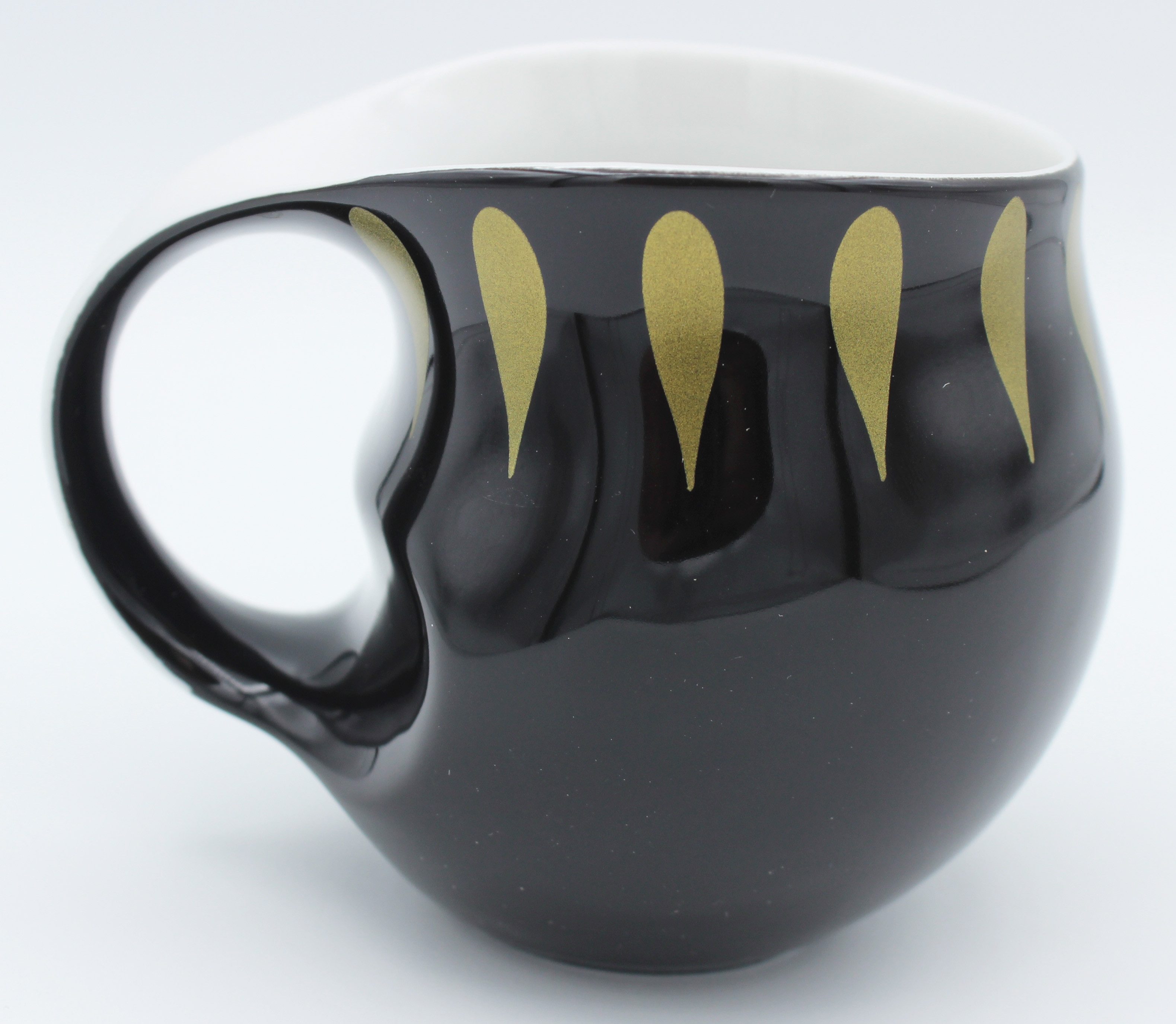 Colani Tasse Tasse Kaffeetasse Drops Schwarz / Gold 260ml, 1-tlg., Porzellan, außergewöhnliche Form