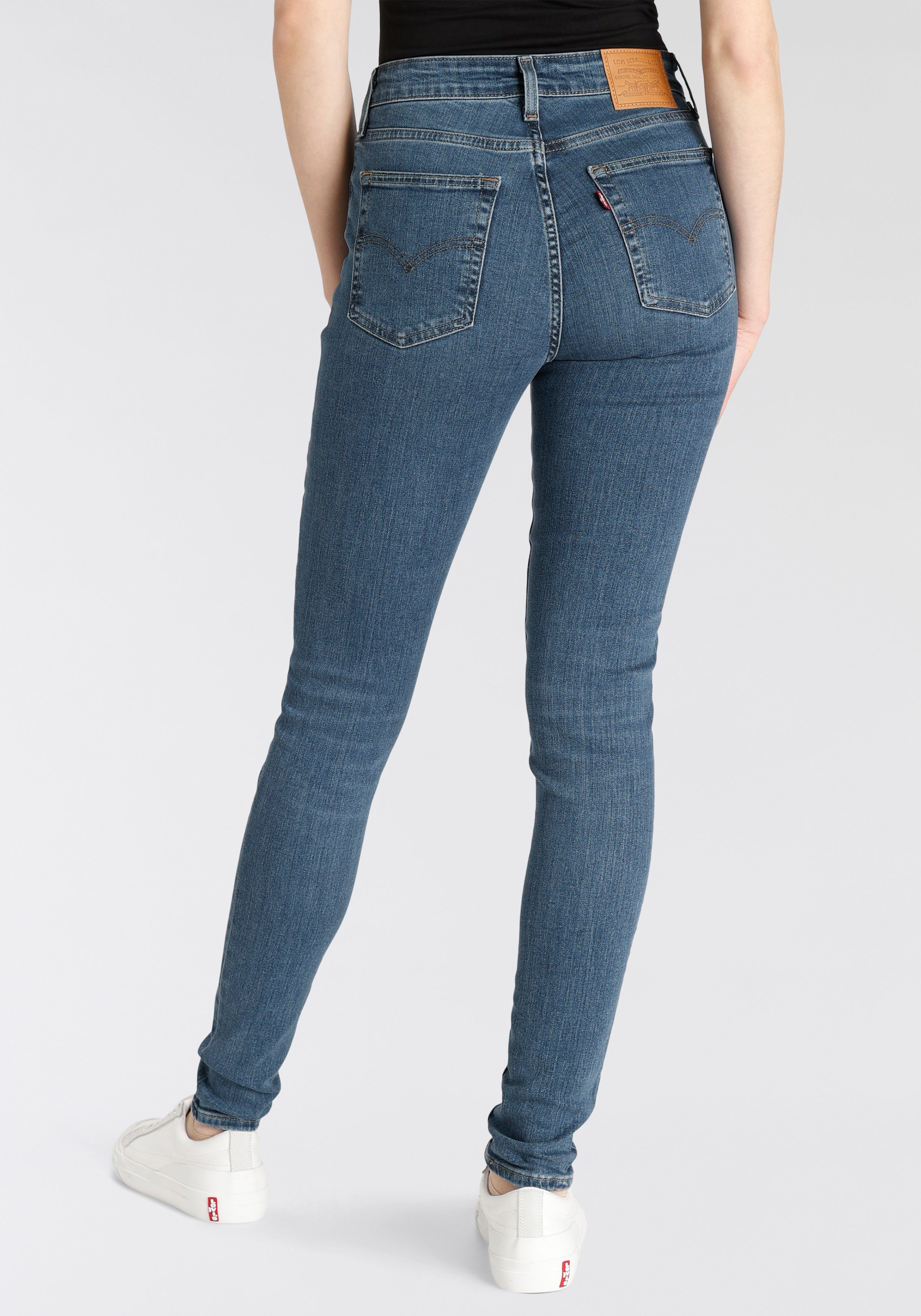 in Levi's® Bund rise Skinny-fit-Jeans 721 mid indigo hohem worn skinny High mit blue