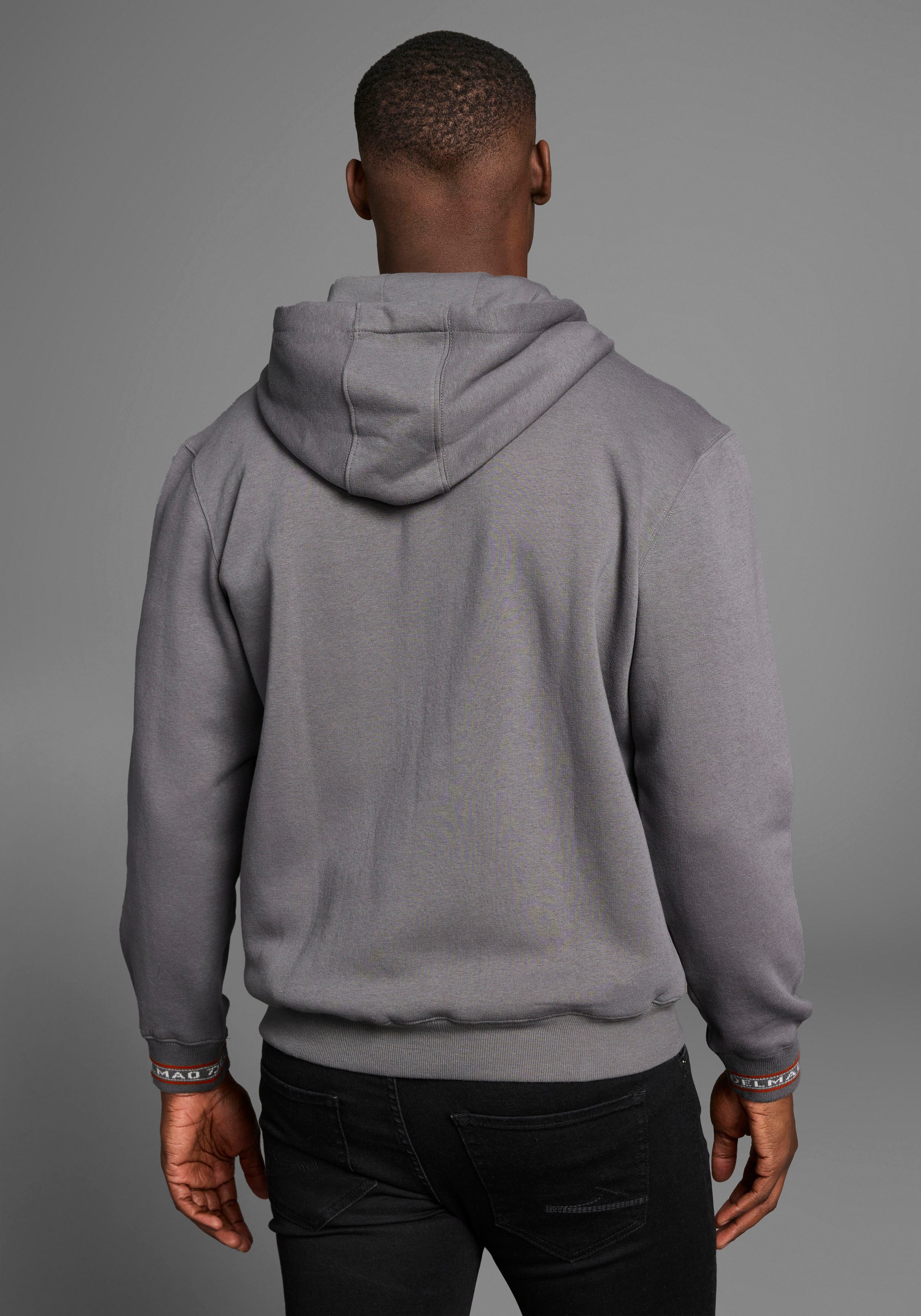 DELMAO Kapuzensweatjacke mit kontrastfarbenen Reißverschlüssen günstig online kaufen