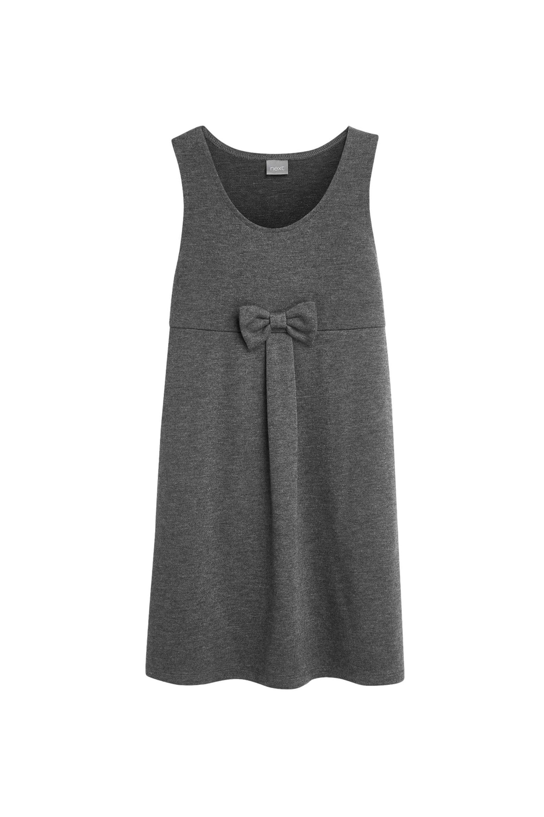 Latzkleid Schul-Latzkleid aus Jersey mit Zierschleife