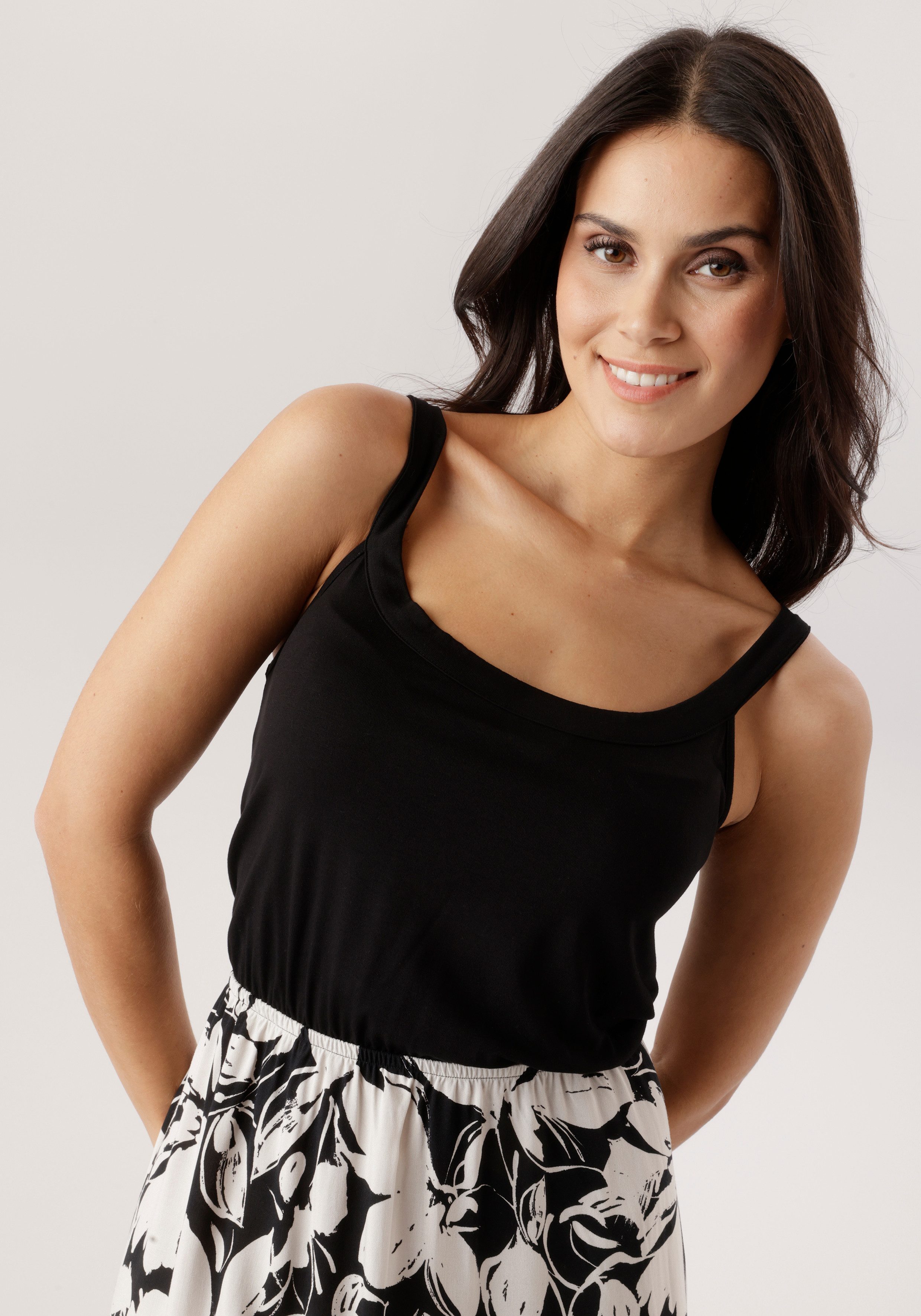 Aniston SELECTED Sommerkleid unifarbenes Shirtteil und geblümten Rockteil