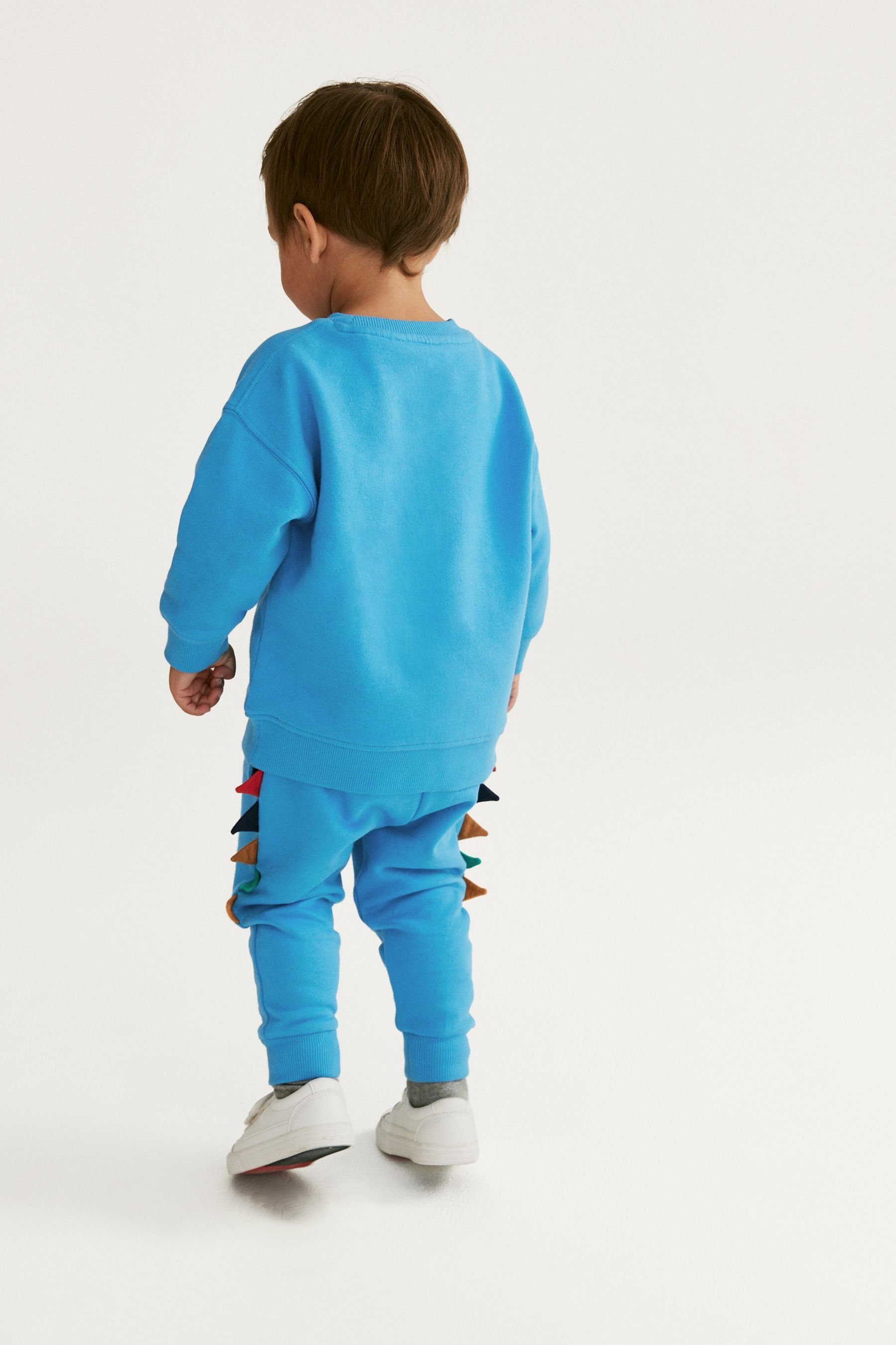 Next Sweatanzug Sweatshirt mit (2-tlg) im Motiv Set Blue und Dinosaur Jogginghose