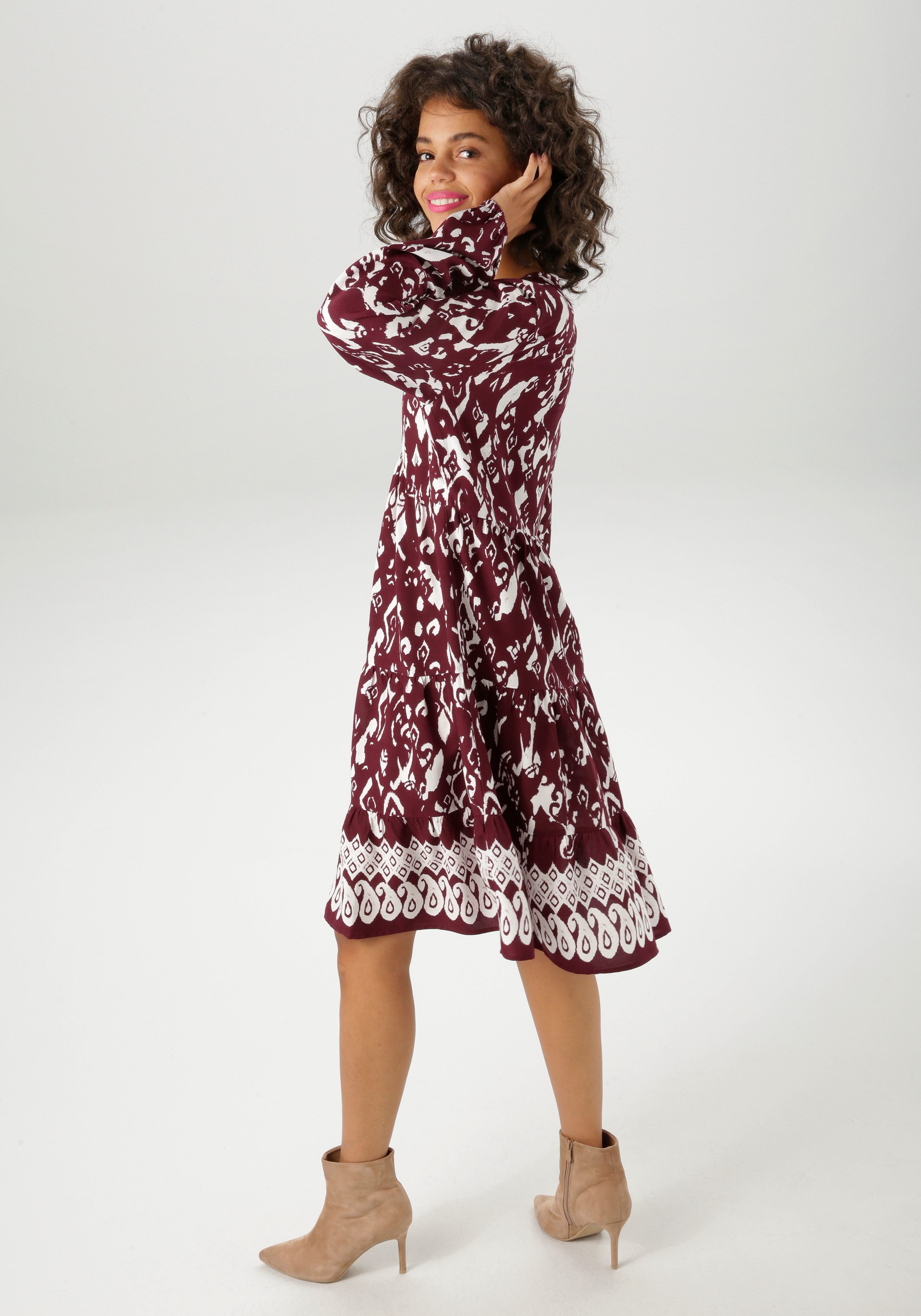 Aniston CASUAL Tunikakleid mit kunstvollem Druck und Bordüre am Saum günstig online kaufen