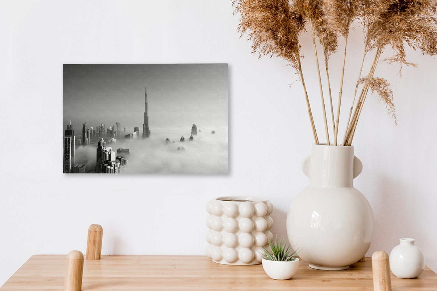 in Wandbild weiß, dem OneMillionCanvasses® Aufhängefertig, Nebliger Burj Leinwandbild (1 Leinwandbilder, Dubai St), - Morgen und unter Wanddeko, cm 30x20 schwarz Khalifa