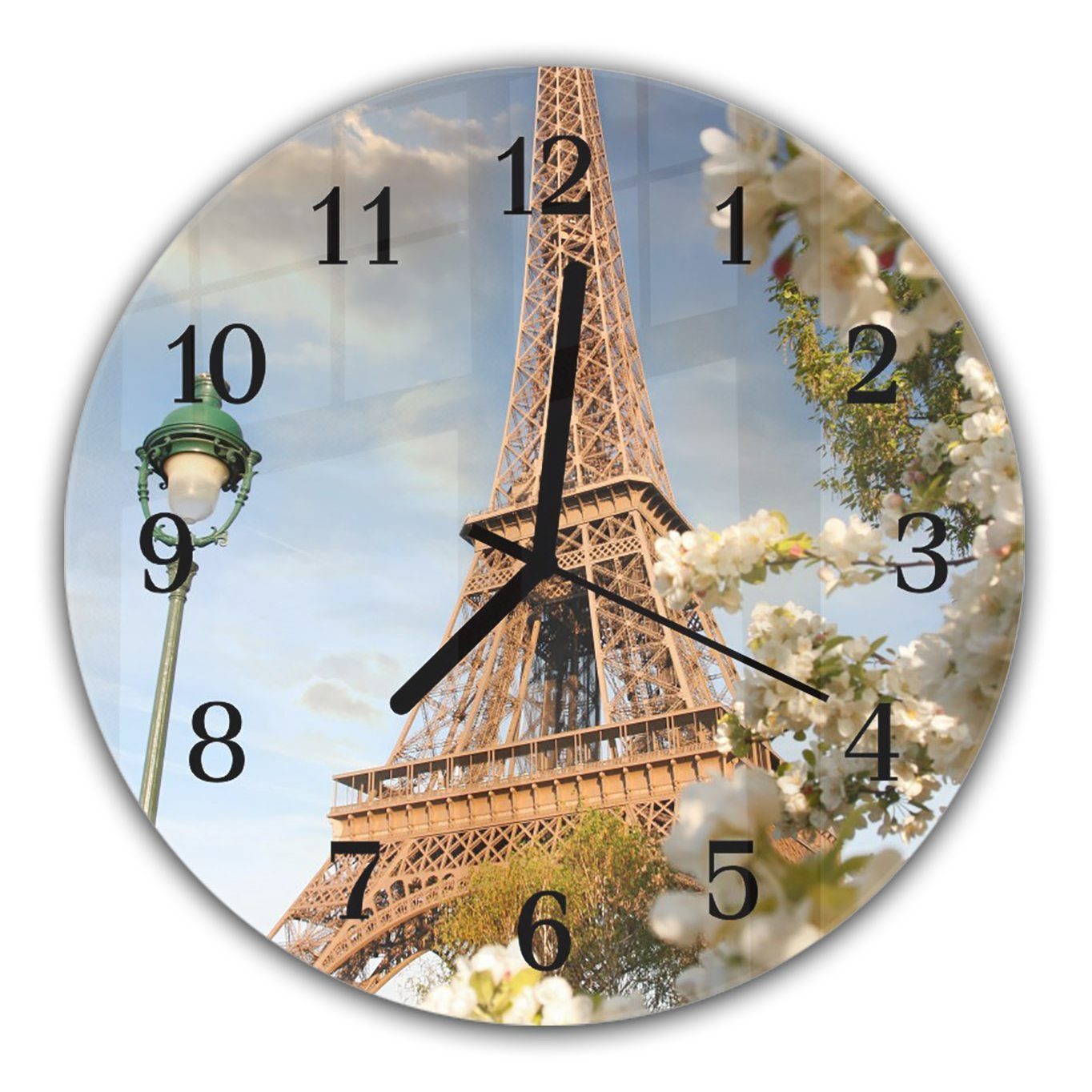 Primedeco Wanduhr Wanduhr aus Glas mit Motiv Eiffeltum im Frühling - Rund mit Durchmesser 30 cm und Quarzuhrwerk | Wanduhren