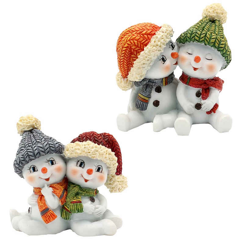 Dekohelden24 Dekofigur Schneekinderpaar als 2er Set, mit Mütze und Schal, in rot, grau, orange und grün, sitzend L/B/H 5,5 x 3,5 x 5,5 cm