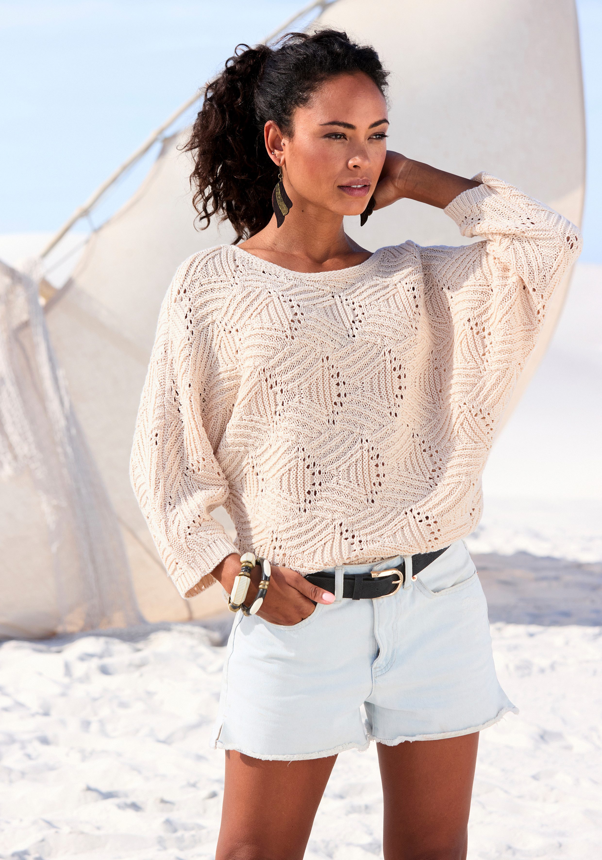 Fledermauspullover mit aufwendigem Strickmuster, Lochstrickmuster