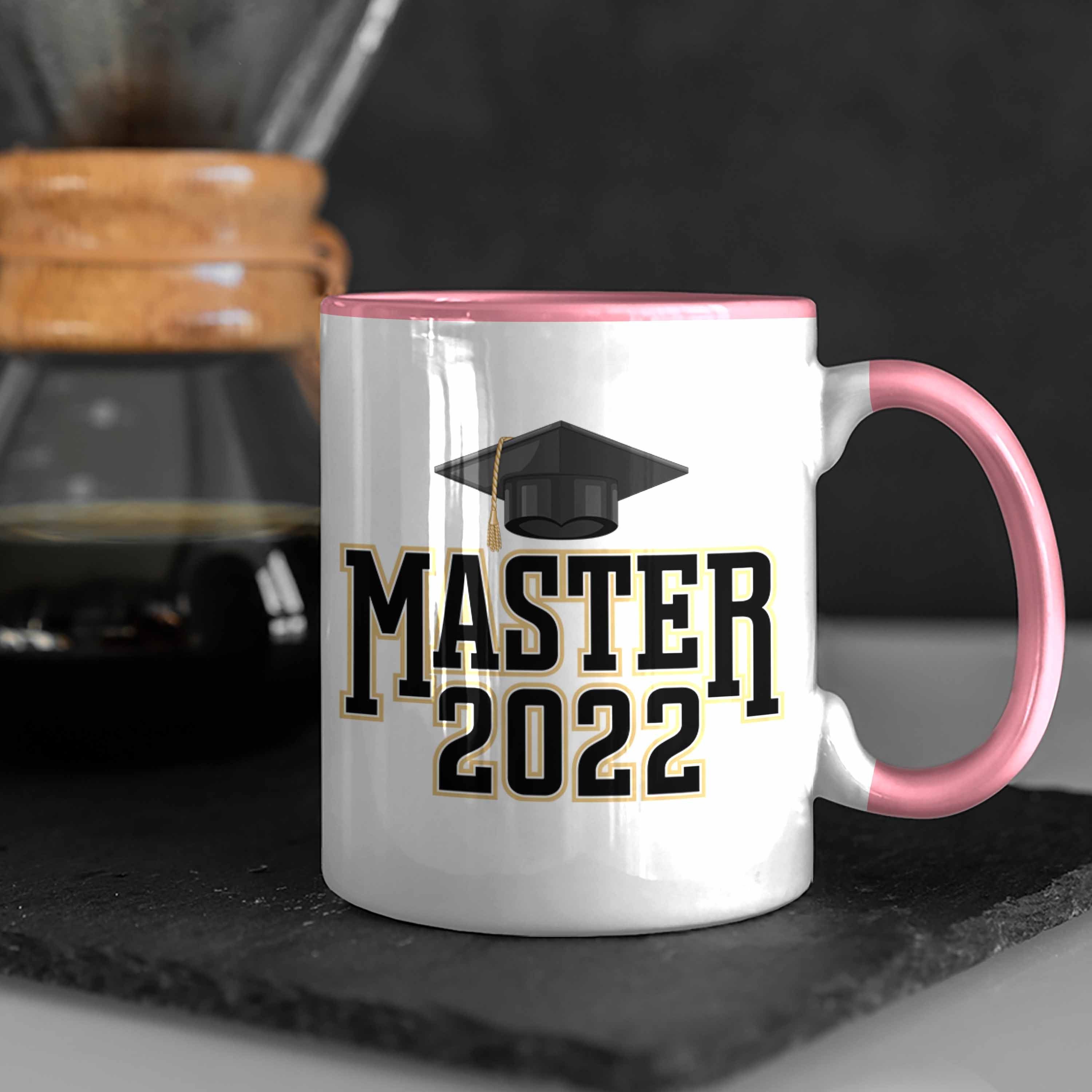 Trendation Tasse Trendation - Geschenk Prüfung Graduation Studium Tasse 2022 Master Abschluss Rosa Bestanden