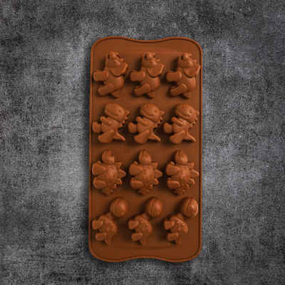 Pure Xocolate Schokoladenform Dino Silikonform für Schokoladen und Pralinen (1-tlg), (1-tlg), Dinos